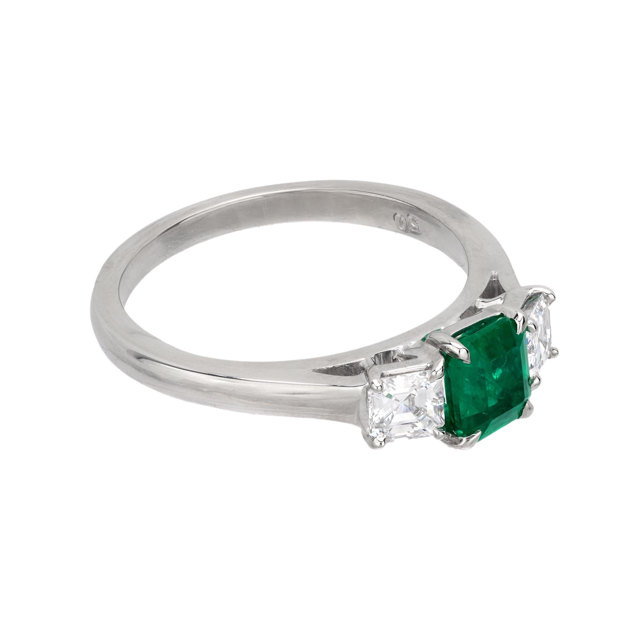 Emerald Cut Mid Century emerald diamond platinum 3 stone ring