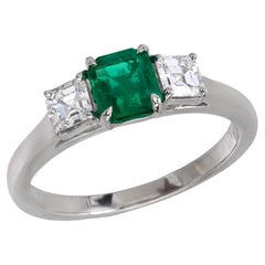 Mid Century emerald diamond platinum 3 stone ring