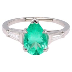 Anello in platino con smeraldo e diamante di metà secolo