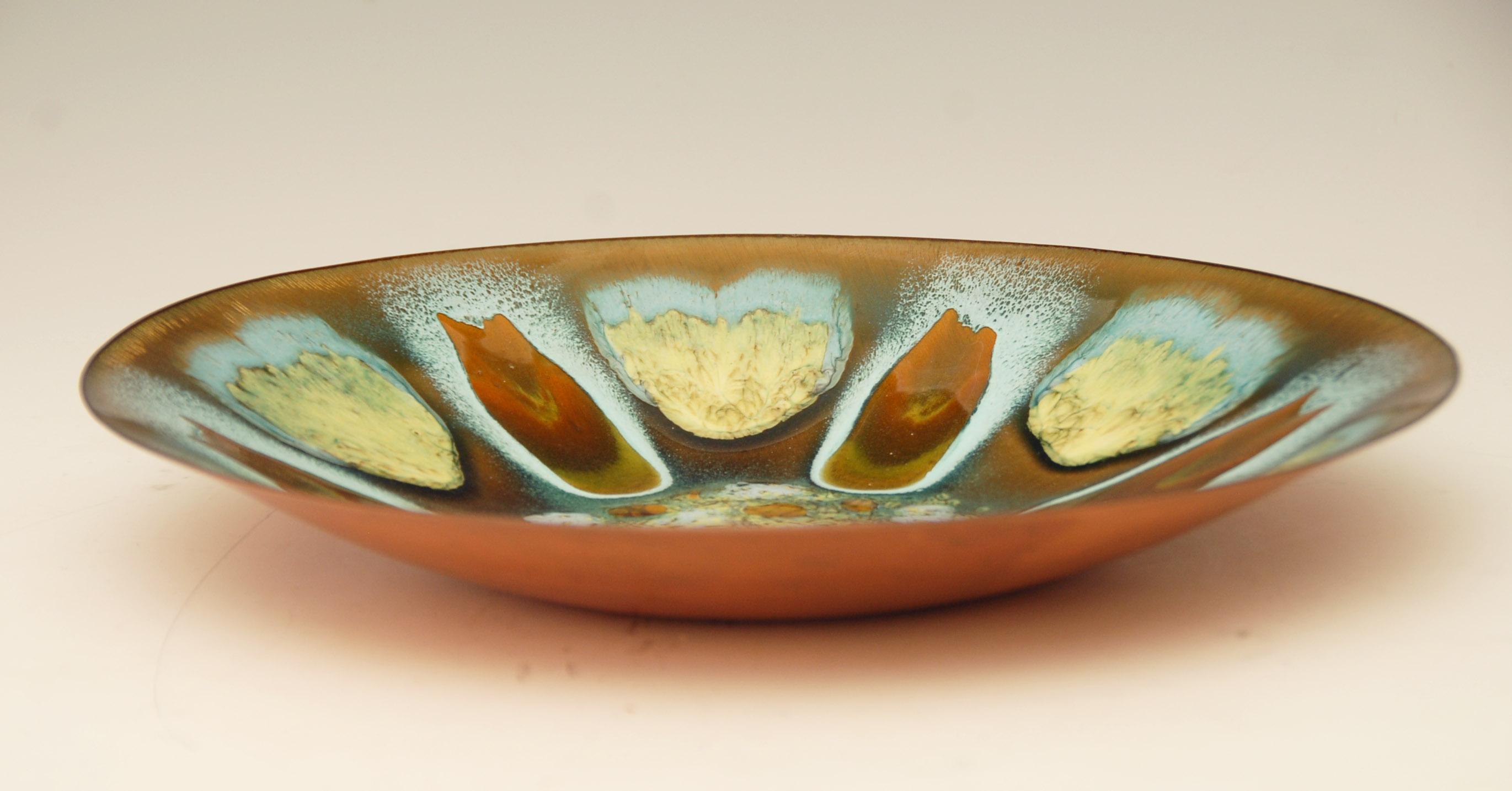 Midcentury enameled copper dish signed by Edward Star for the sadly defunct Grumps of San Francisco.

Price includes shipping to anywhere in the world.
