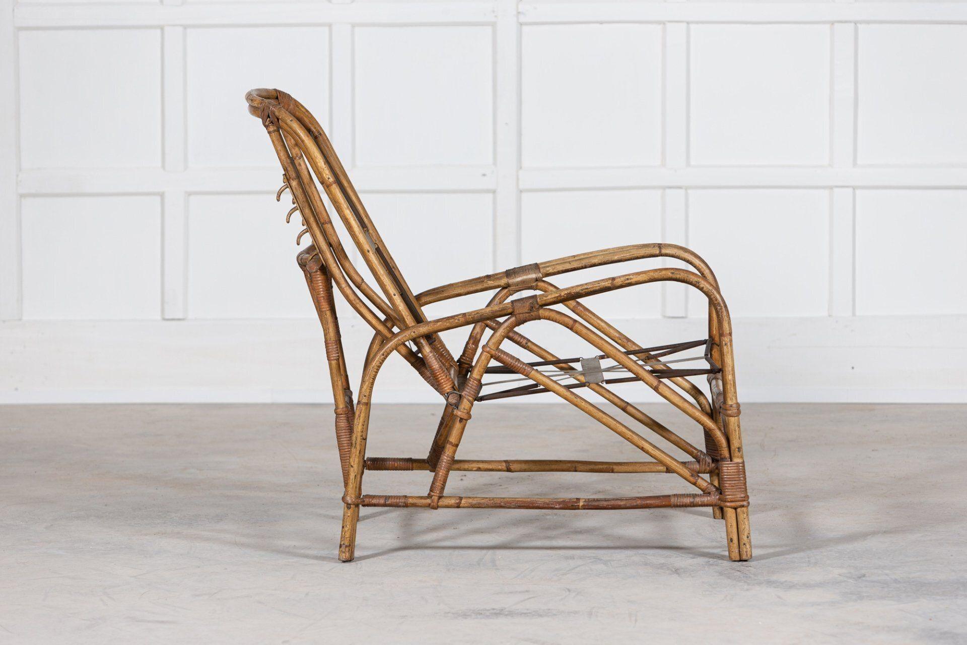 Circa 1950
Mid-century English bamboo reclining armchair.
Sku 1118
W60 x D98 x H91cm.
Seat height 39cm.