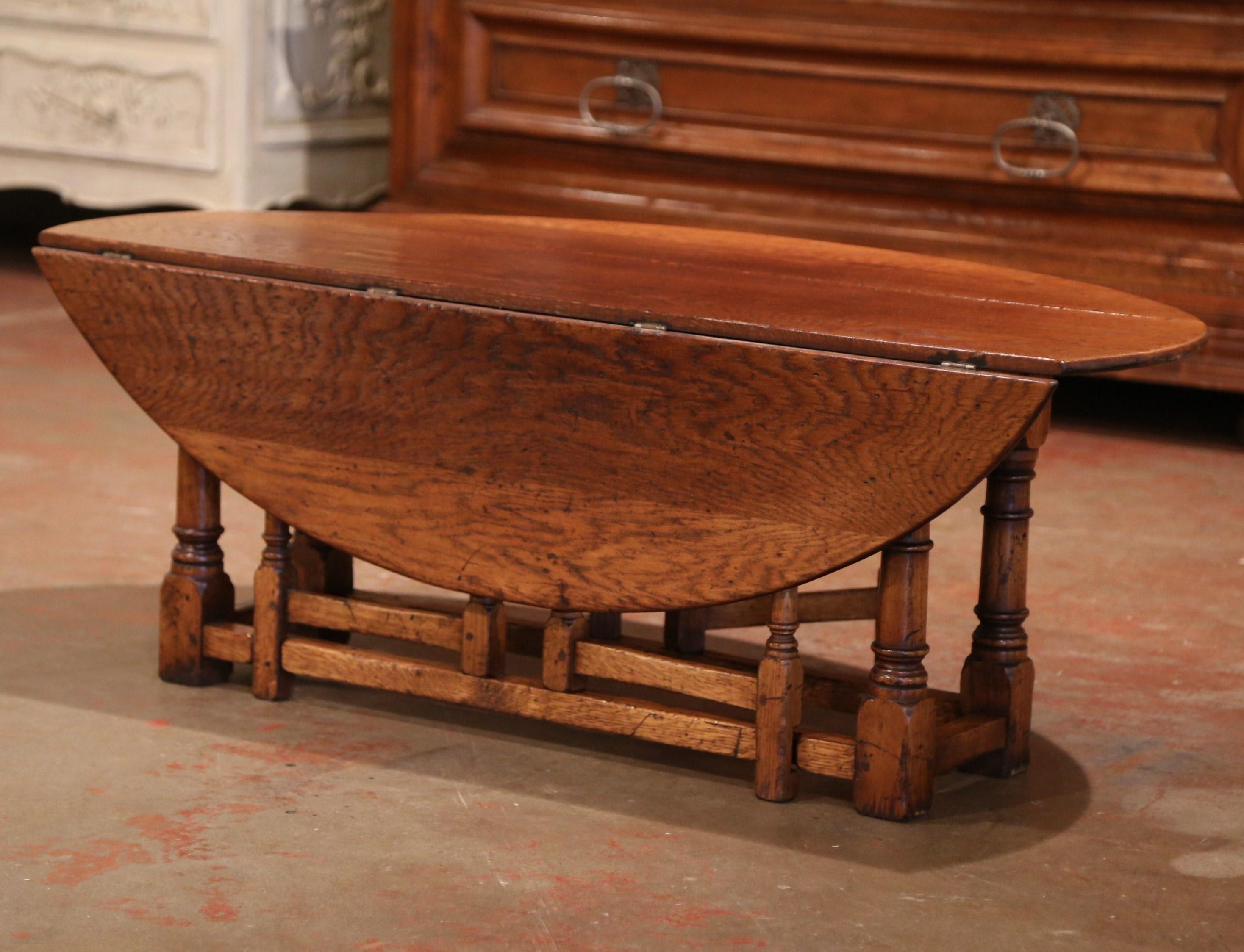 Patinated Midcentury English Carved Chestnut Gate Leg Drop Leaf Coffee Table