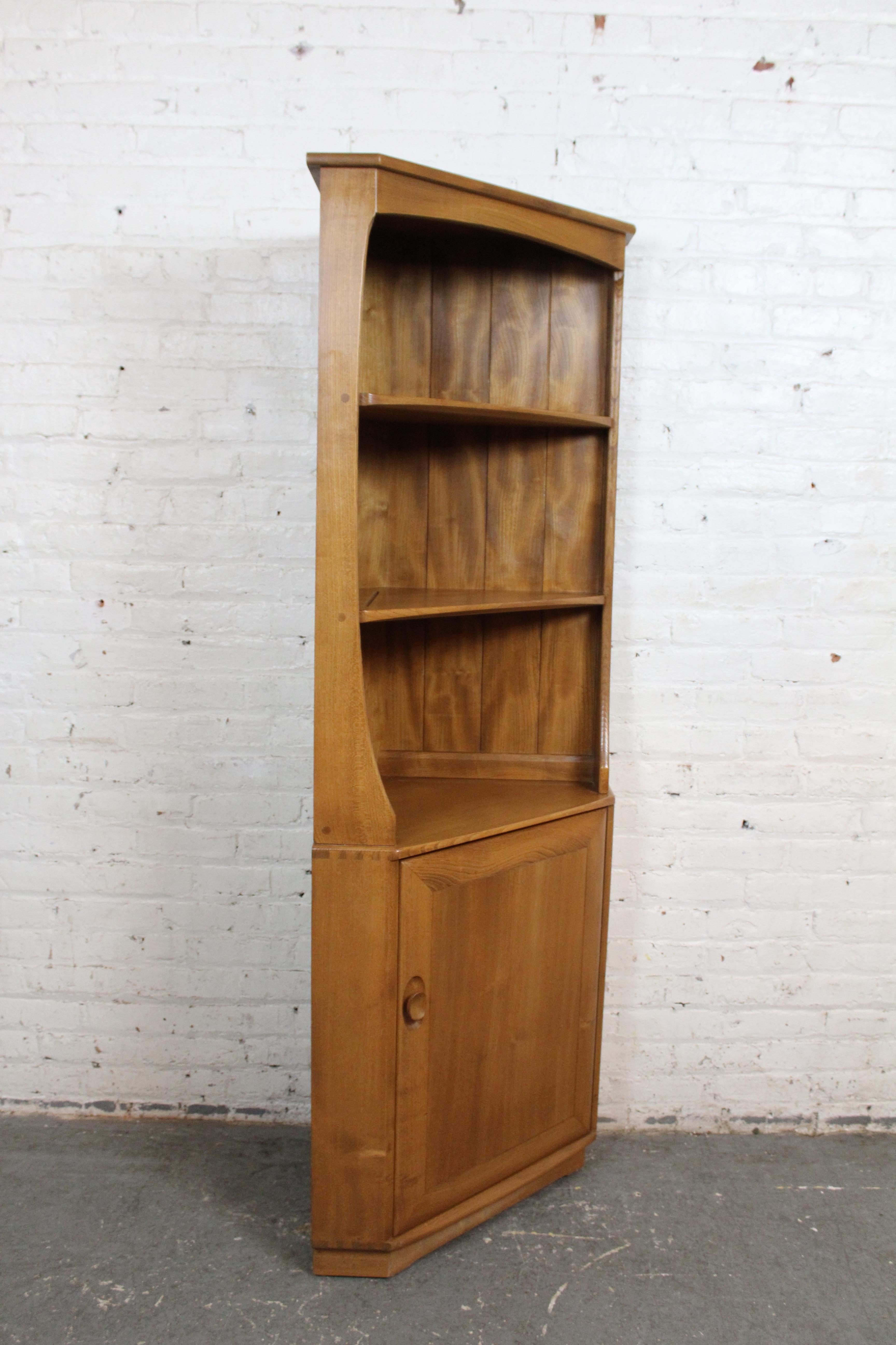 Carved Mid-Century English Elm Corner Cupboard by Ercol For Sale
