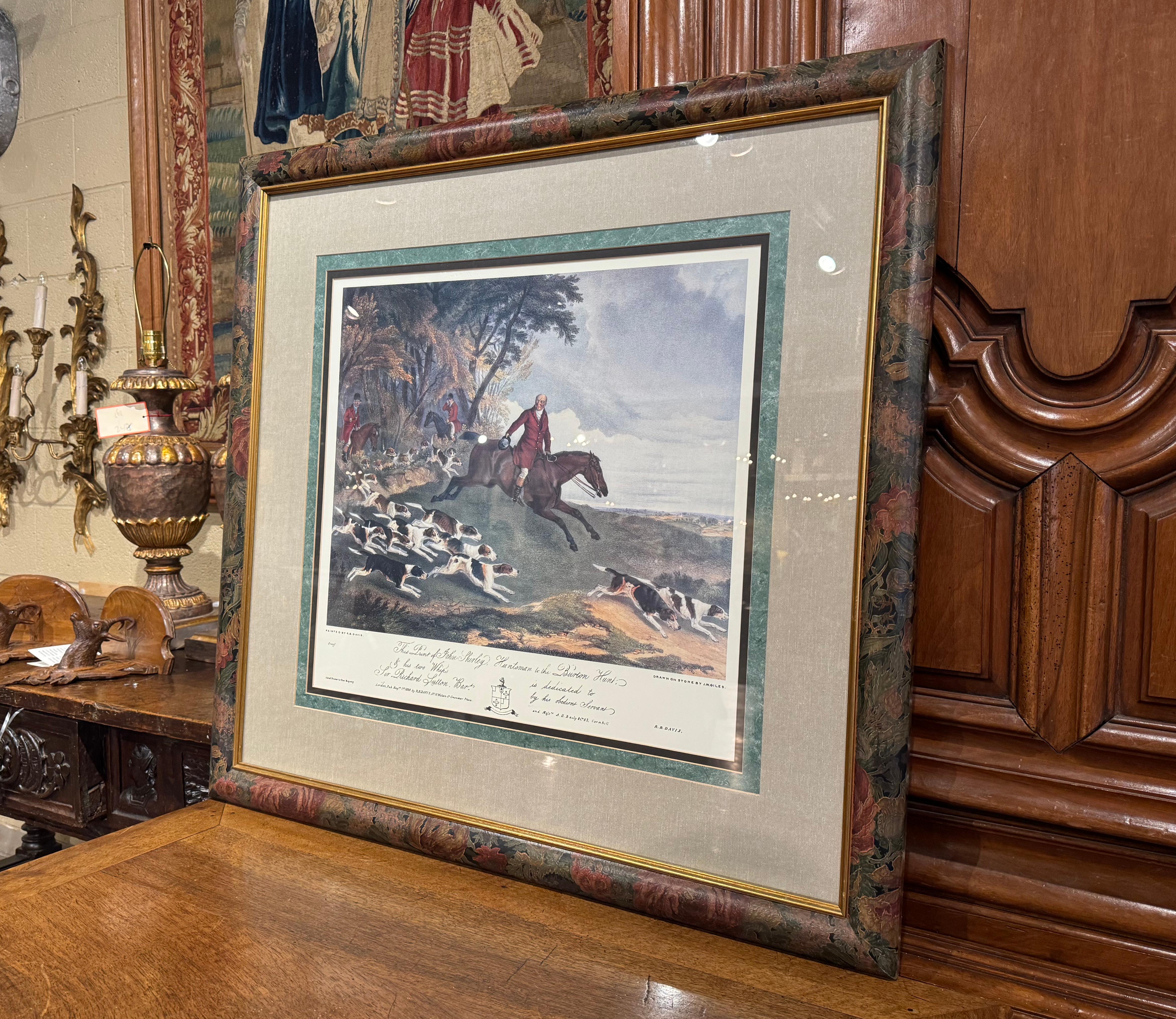 Decorate a ranch or a hunting lodge with this elegant framed antique watercolor. Crafted in England circa 1950, and set in a burl wood frame, the scene shows men on horseback with a pack of hunting dogs in pursuit, a common subject in British