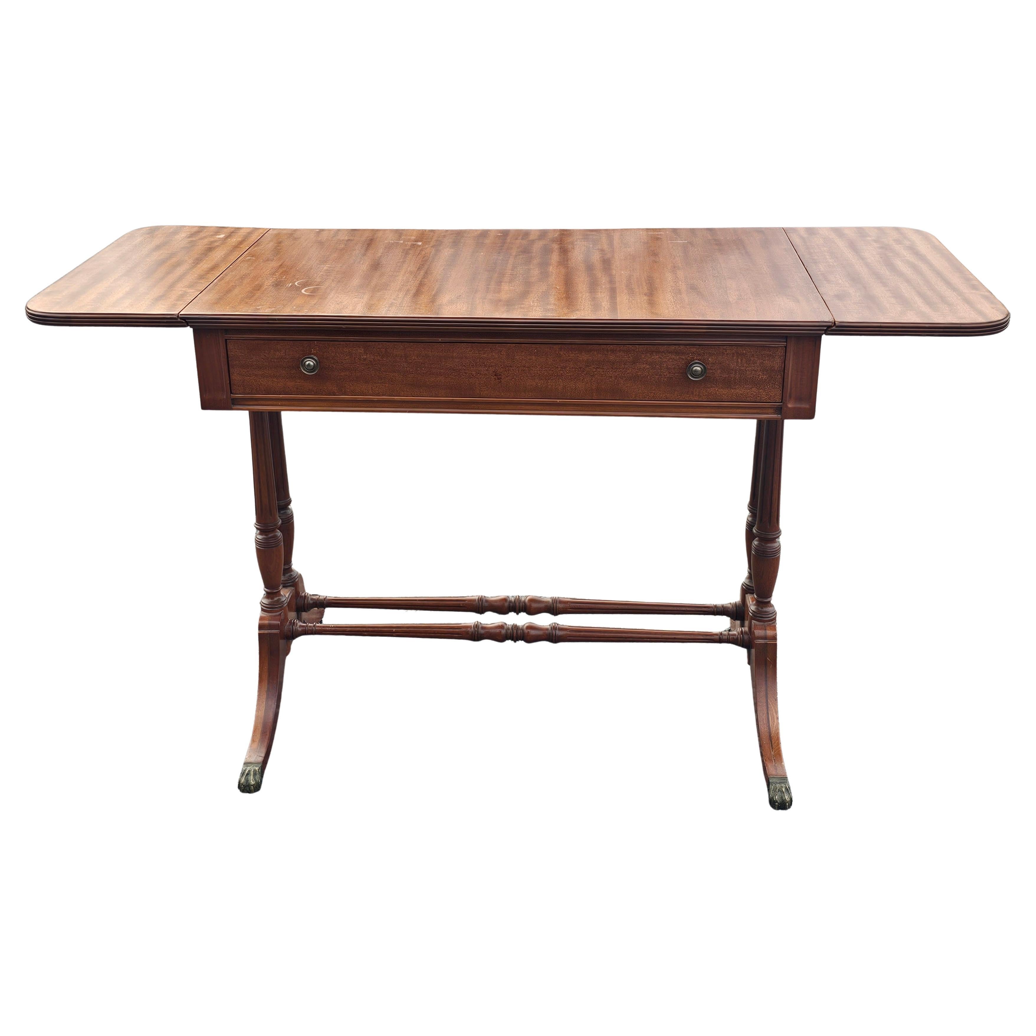 A Mid Century Mid Size English Regency Mahogany Drop Leaf Sofa Table or Writing Desk. Single item sale. Measures 49