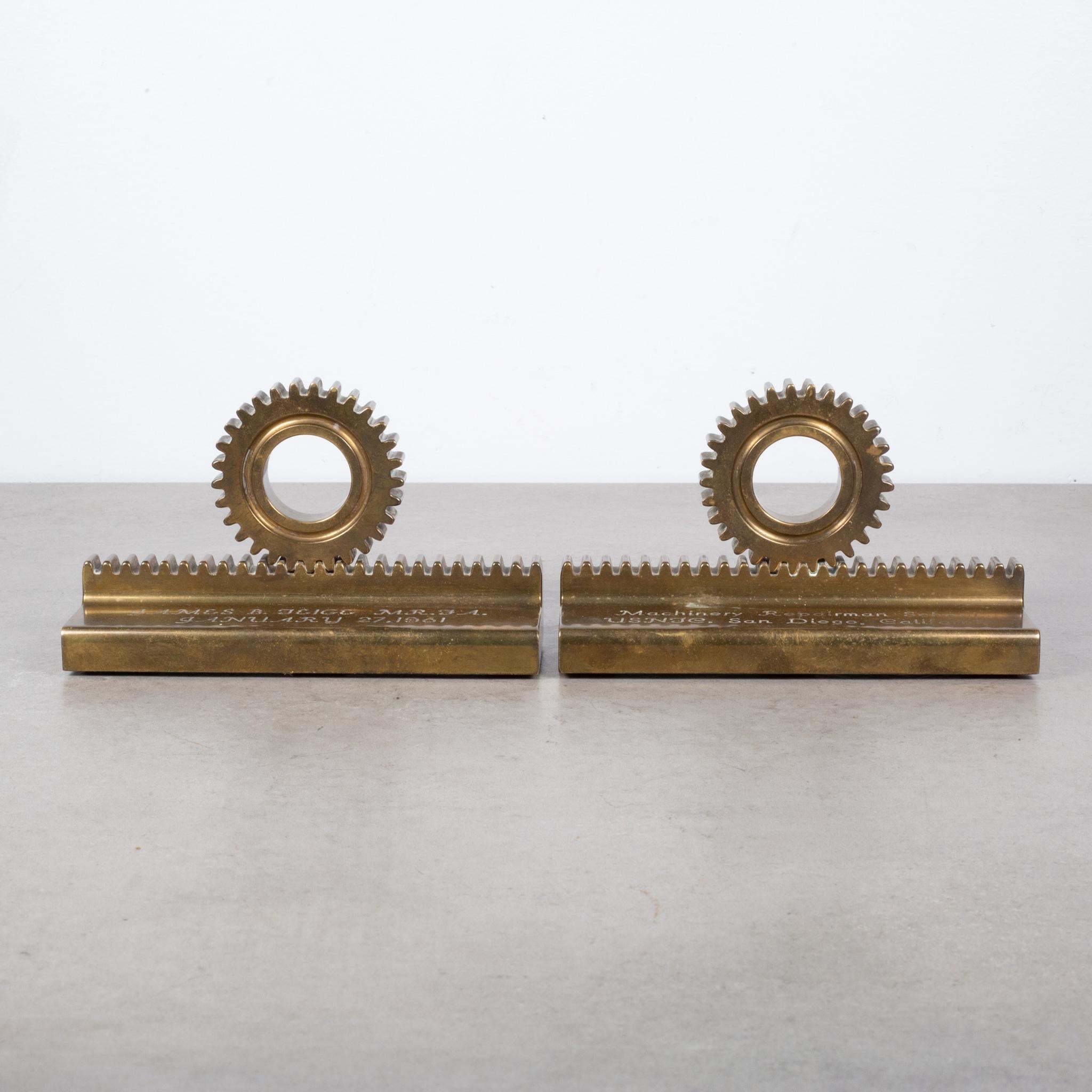 ABOUT

A pair of solid bronze gear bookends. Incised text on one dates them at January 27, 1961, and on the other appears the text Machinery Repairman School, USNJC San Diego, California.

 CREATOR Unknown.
 DATE OF MANUFACTURE c.1950.

