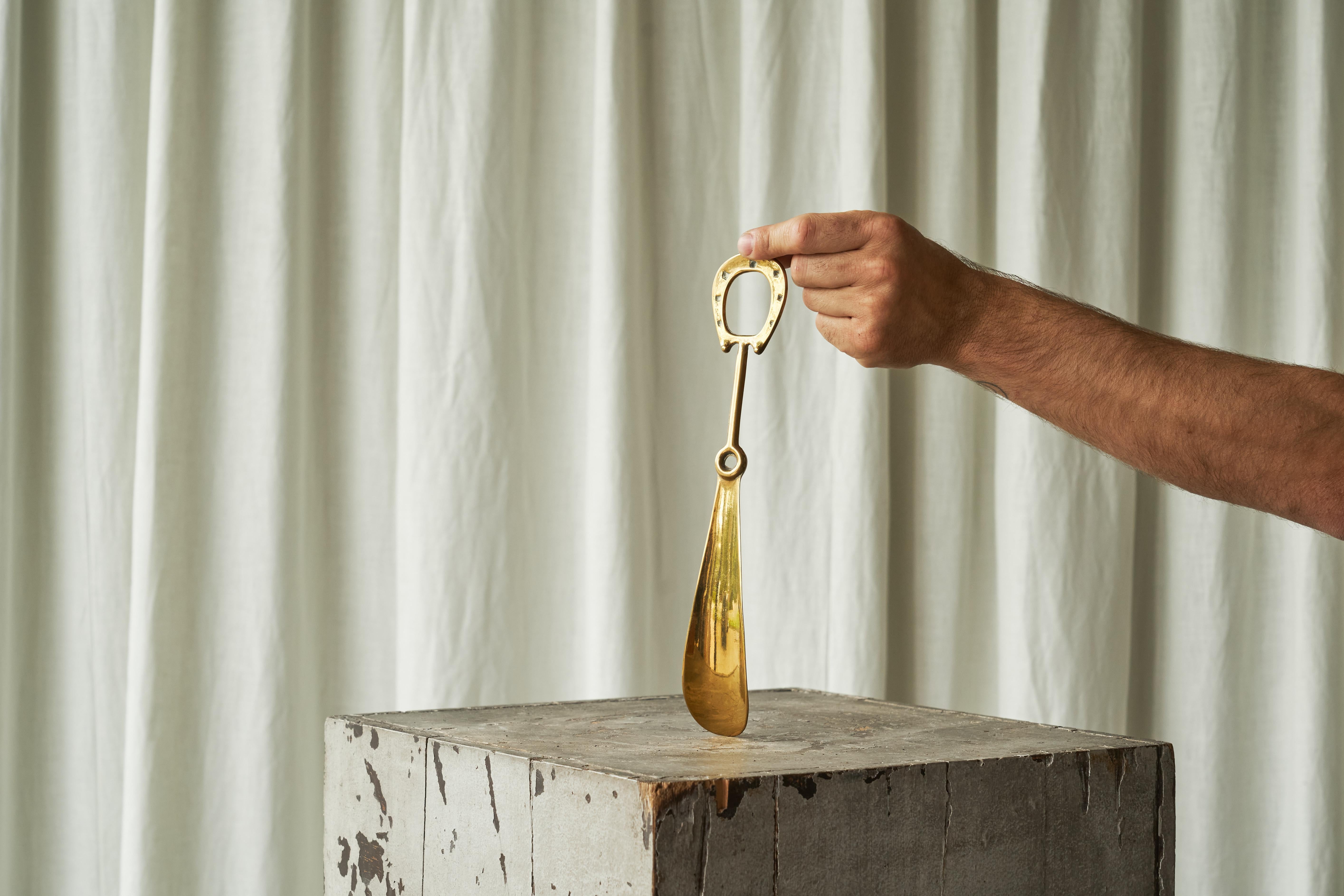 Mid Century Equestrian Style Shoehorn in Sand Cast Brass 1960s

This is a striking mid century equestrian style shoehorn, crafted in the 1960s from sand-cast brass.

The handle features a horseshoe, which not only serves as a symbolic nod to