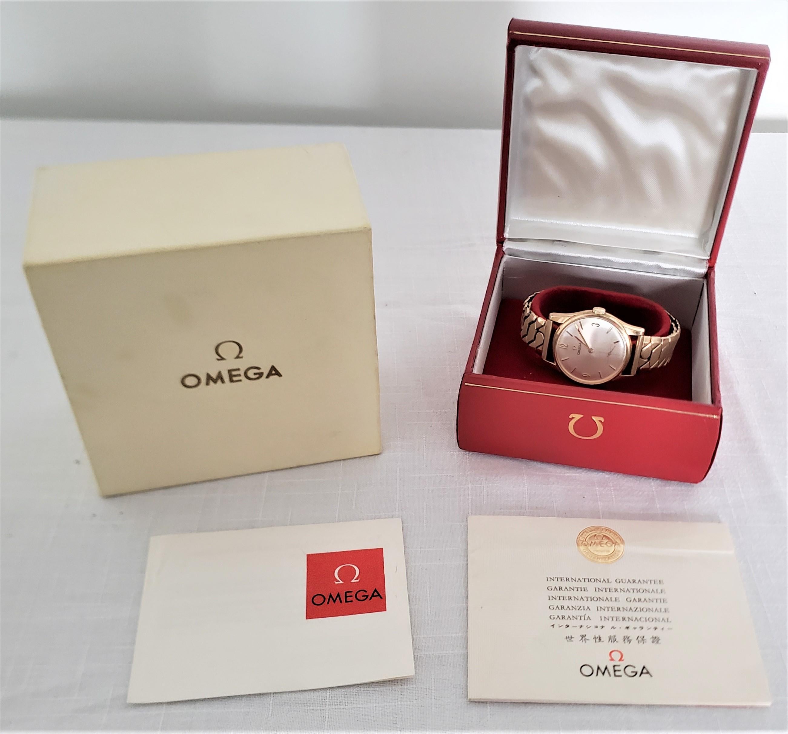 Mid-Century Era 9 Karat Yellow Gold Men's Omega Wristwatch with Boxes & Papers For Sale 1