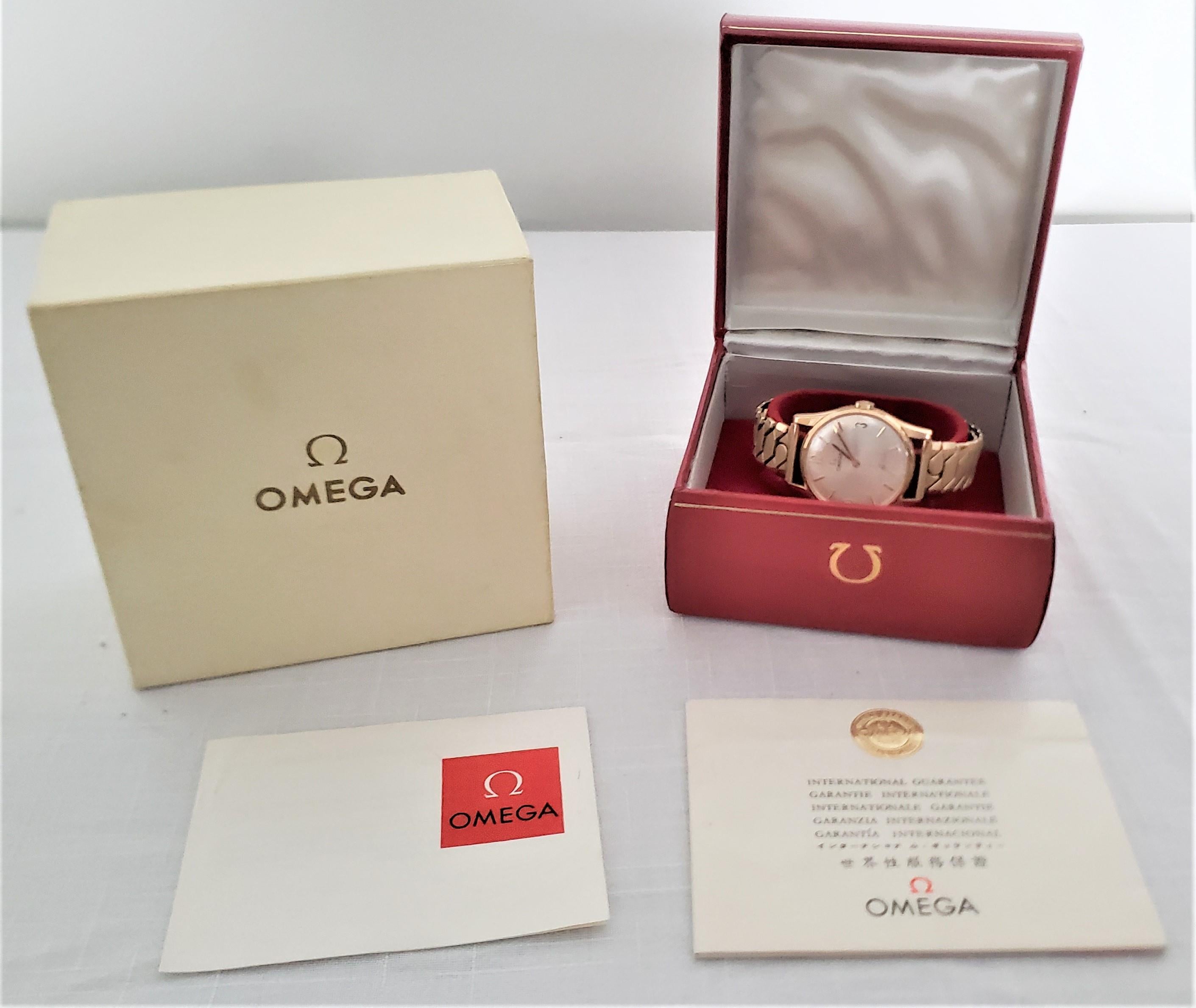 Mid-Century Era 9 Karat Yellow Gold Men's Omega Wristwatch with Boxes & Papers For Sale 3