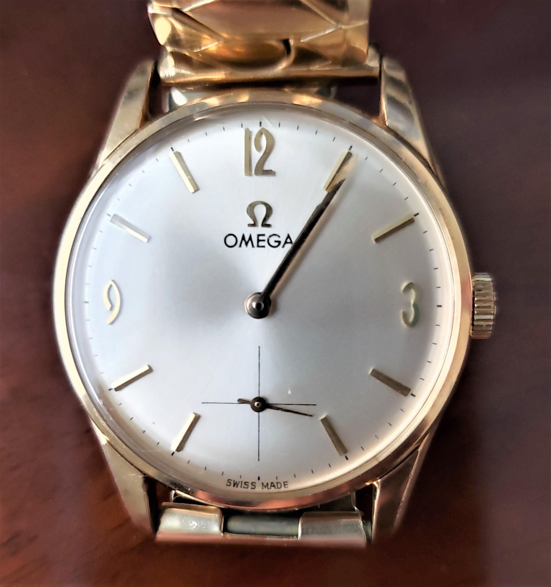 Swiss Mid-Century Era 9 Karat Yellow Gold Men's Omega Wristwatch with Boxes & Papers For Sale
