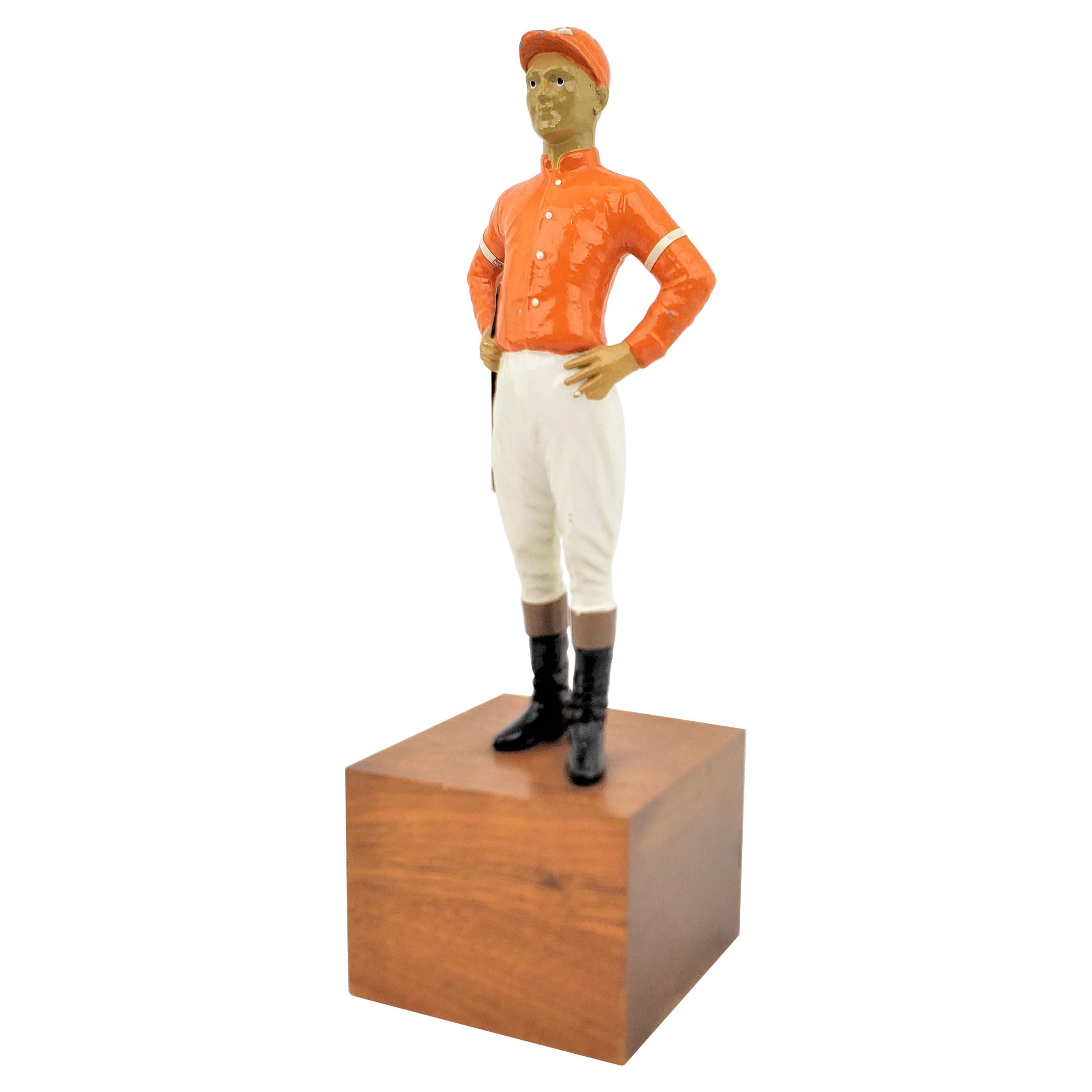 Mid Century Era Cold-Painted Cast Metal Horse Racing Jockey Sculpture For Sale