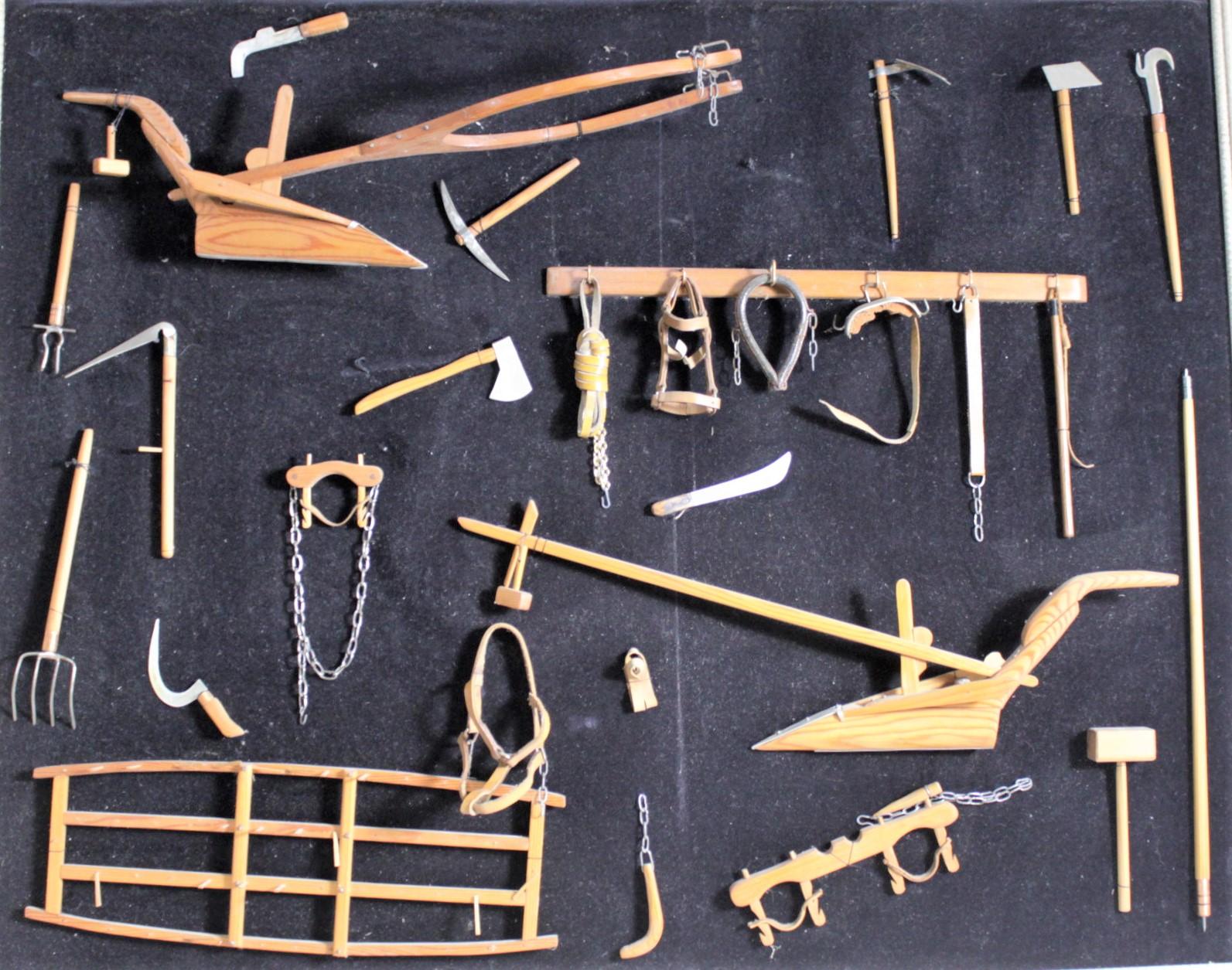 Leather Midcentury Era Folk Art Made Collection of Miniature Antique Farm Implements For Sale