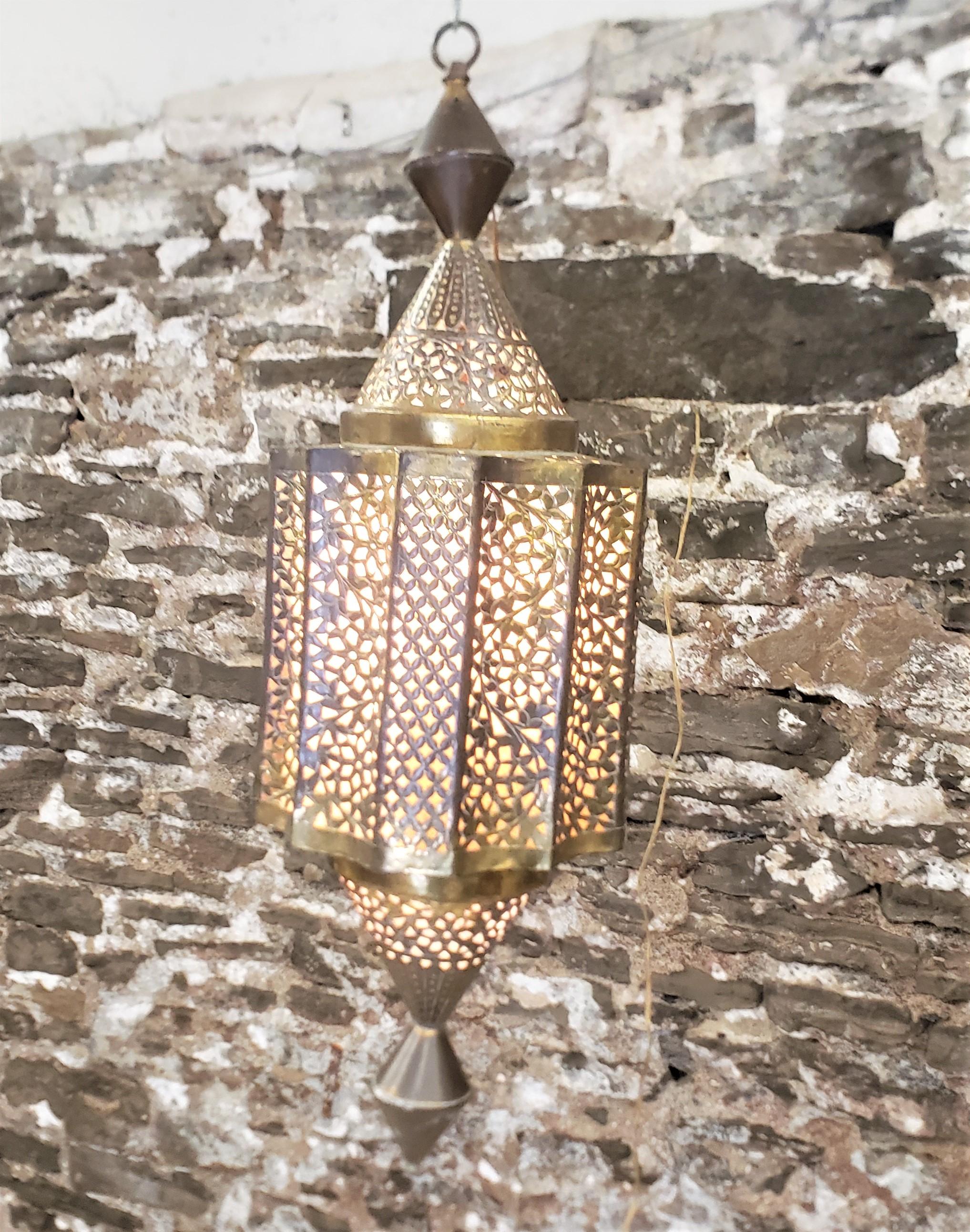 Mid-Century Large Moroccan Moorish Pierced Brass Hanging Lantern or Swag Light In Good Condition For Sale In Hamilton, Ontario