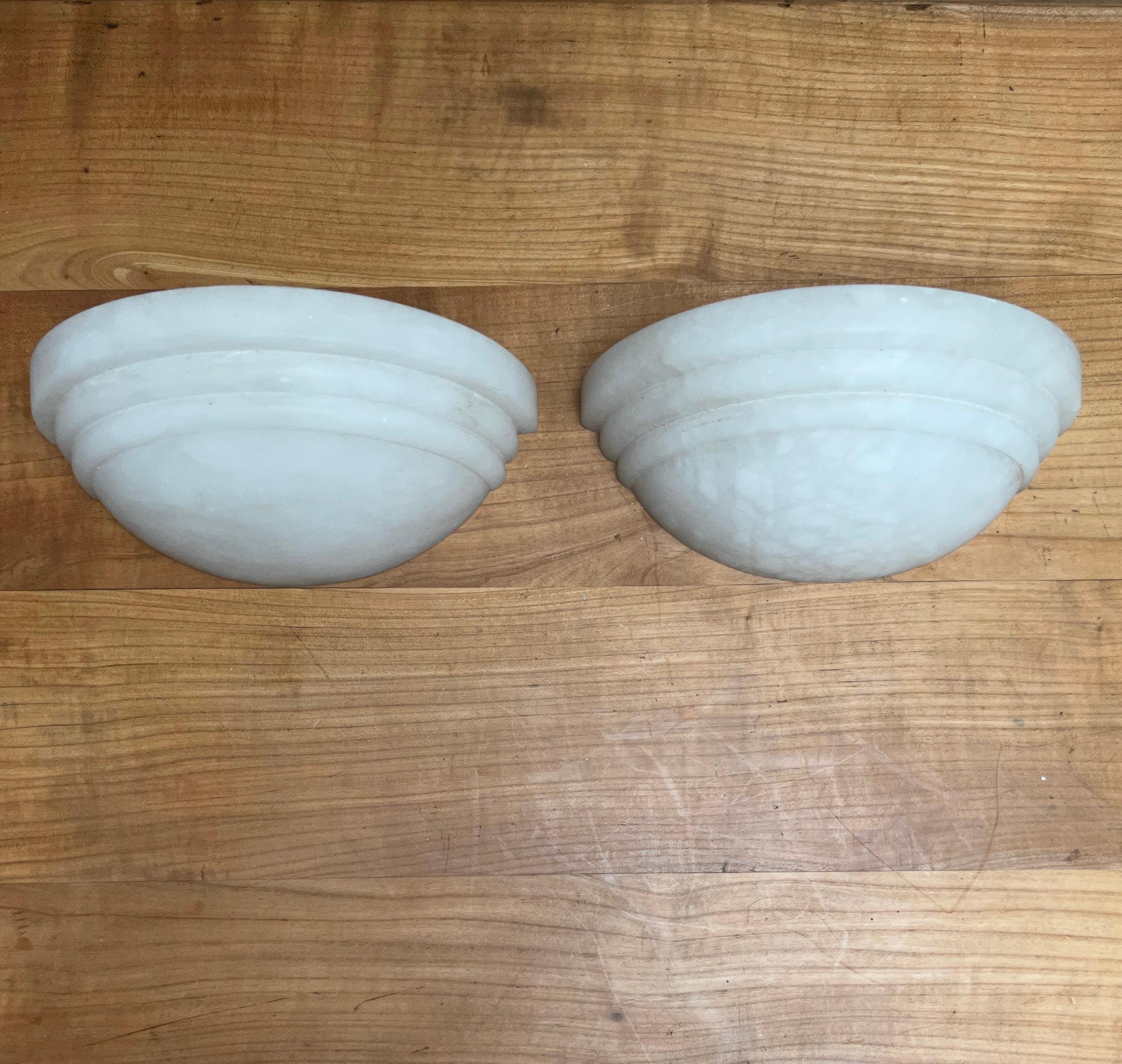 Wonderful shape pair alabaster wall fixtures, fit for any room in your home.

If you are looking for a truly stylish and timeless way to bring light into your entry hall, kitchen, bedroom or in any other room that can do with a quality upgrade then