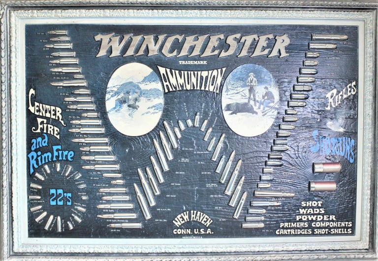This Winchester ammunition store display was made in the United States in circa 1965 in the period Mid-Century Modern style. This wall display is composed entirely of a thin molded plastic giving the appearance of an actual wooden frame and three