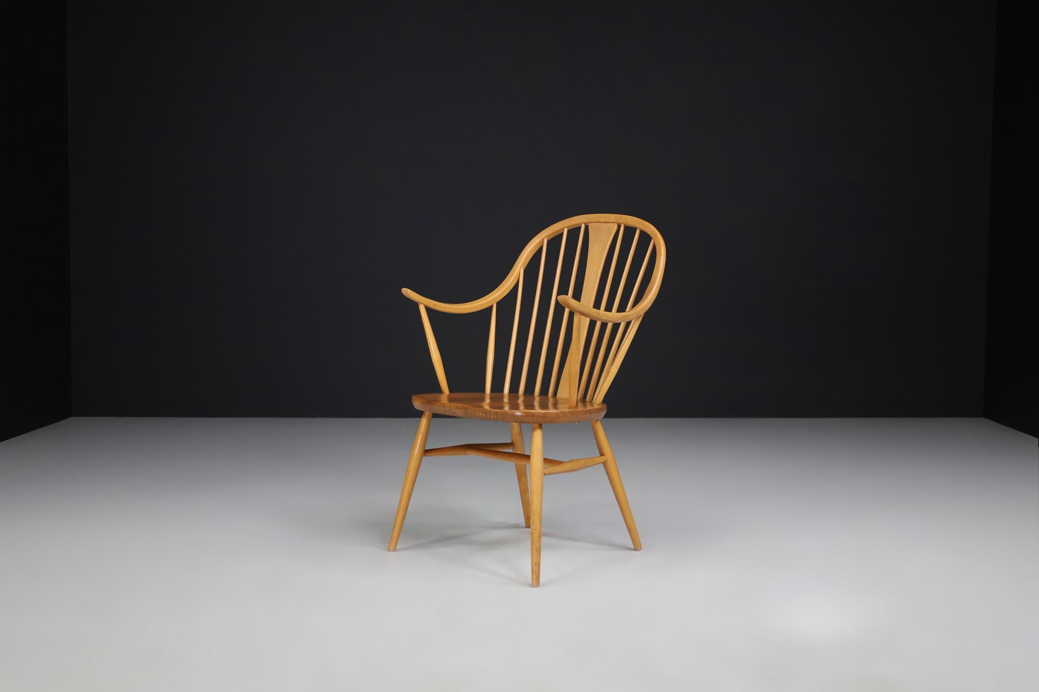 Mid-Century Ercol armchair in beechwood, England, 1960s

This chair is designed by Lucian Ercolani for Ercol in the 1960s. The wooden frame is made out of beech and features an elegant backrest with slim, upright slats structuring the back.