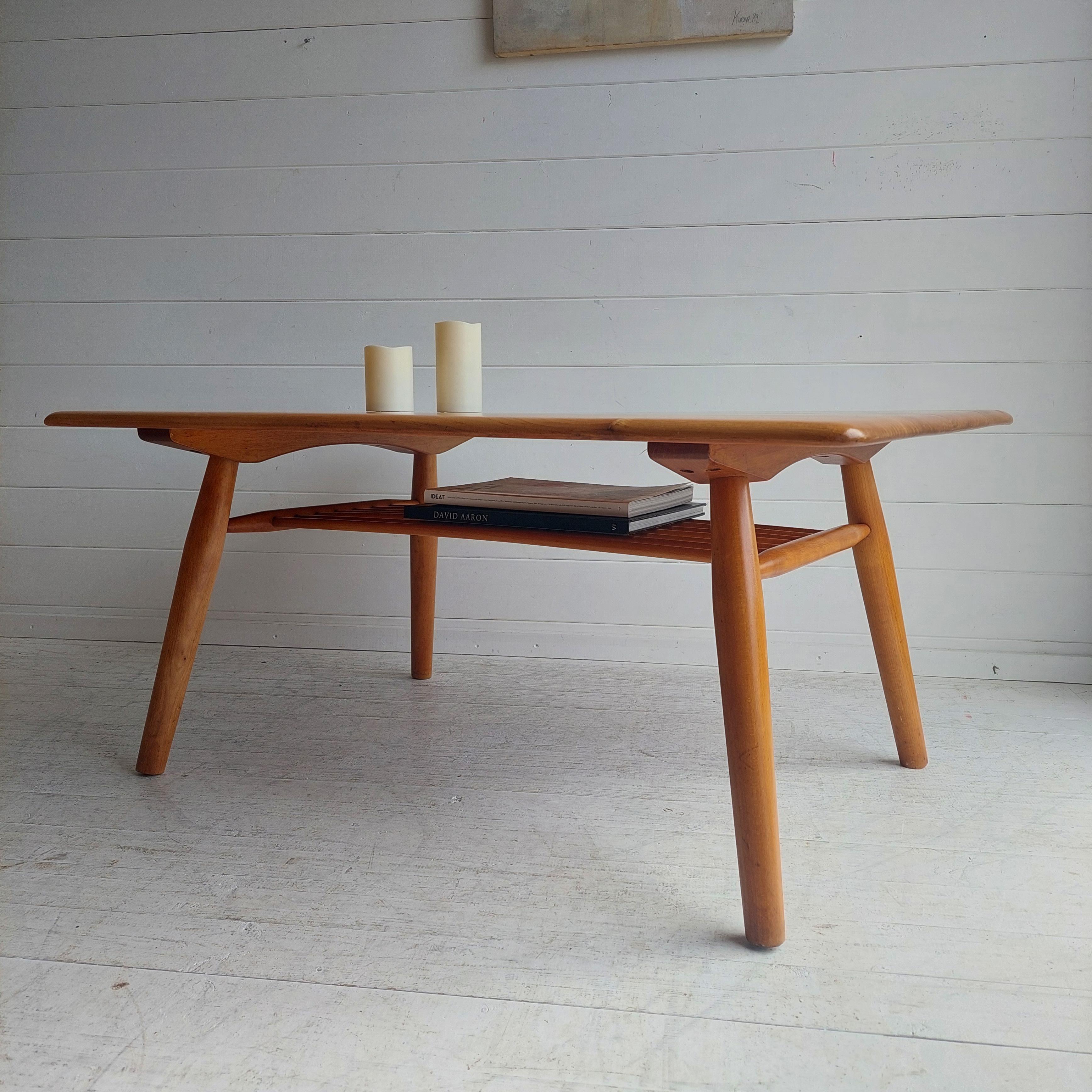 British Mid Century Ercol Blonde coffee table with magazine rack, 1950s 1960s For Sale