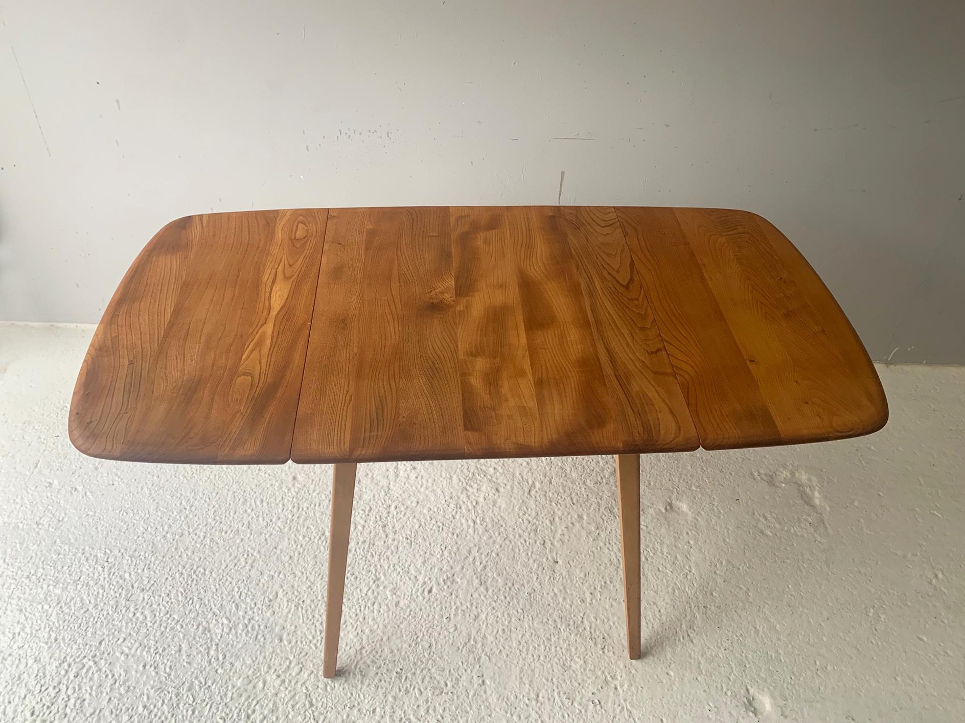 Mid-Century Modern Mid century Ercol Model 492 drop leaf dining table by Lucian Ercolani