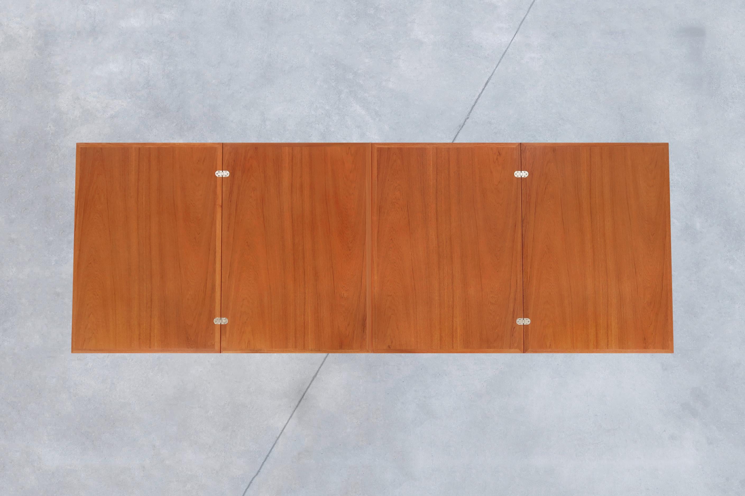 Mid-Century Expanding Teak Dining Table by Folke Ohlsson for Dux For Sale 4