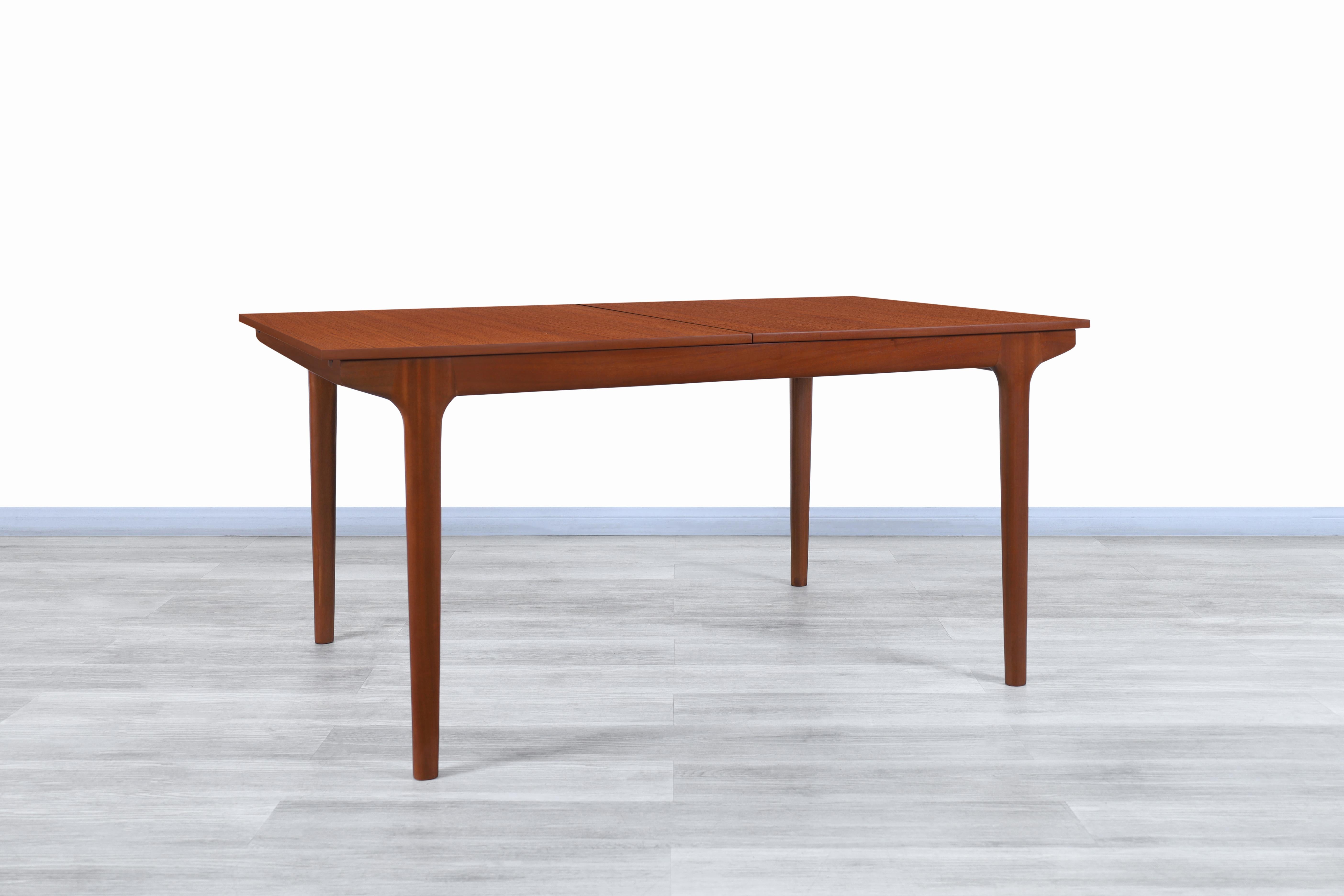 Mid-20th Century Midcentury Expanding Teak Dining Table by McIntosh