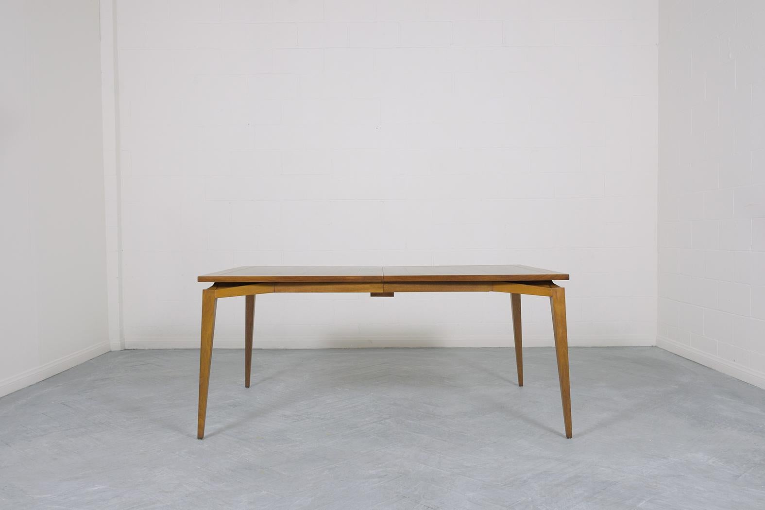 Mid-Century Modern Extendable Walnut Dining Table: Timeless Elegance & Utility For Sale 2