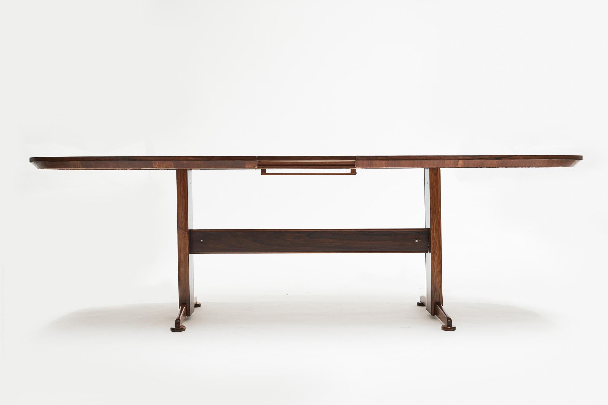 Available today, this magnificent Brazilian Modern Extendable Dining Table in Hardwood from Novo Rumo is gorgeous!

This table is made of Brazilian Rosewood, as known as Jacaranda. The table has an extending board. When is closed, it fits 6 people