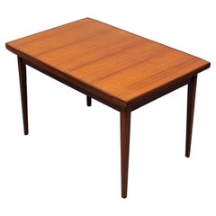  Mid Century extendable dining table made of teak in the 1960s   