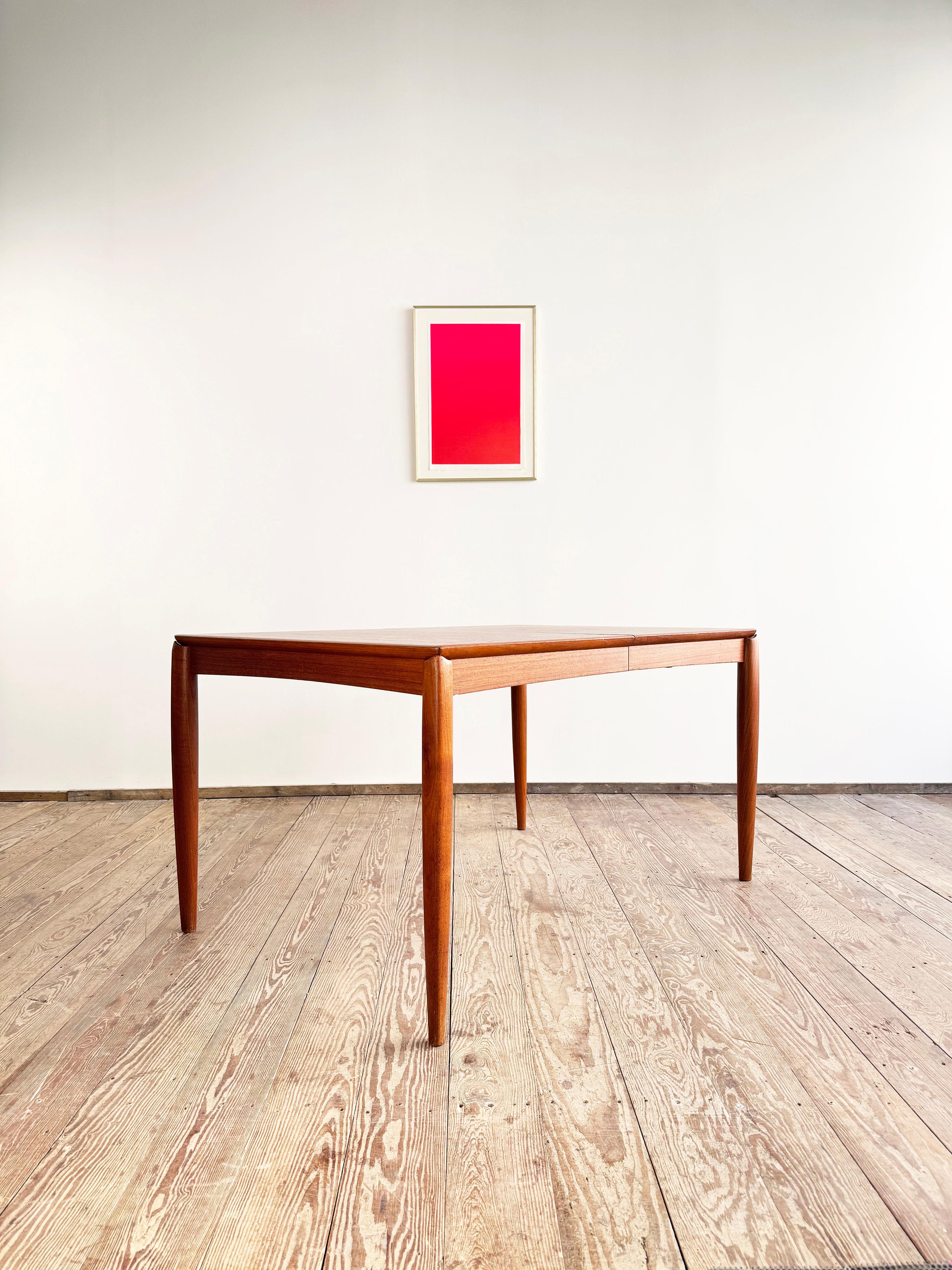 Dimensions 135 / 195 x 90 x 74 cm

Elegant dining table designed by H.W. Klein and manufactured in Denmark by Bramin. This table has sculpted corners with beautiful wood grain and color and can be extended by pulling on both sides and adding an
