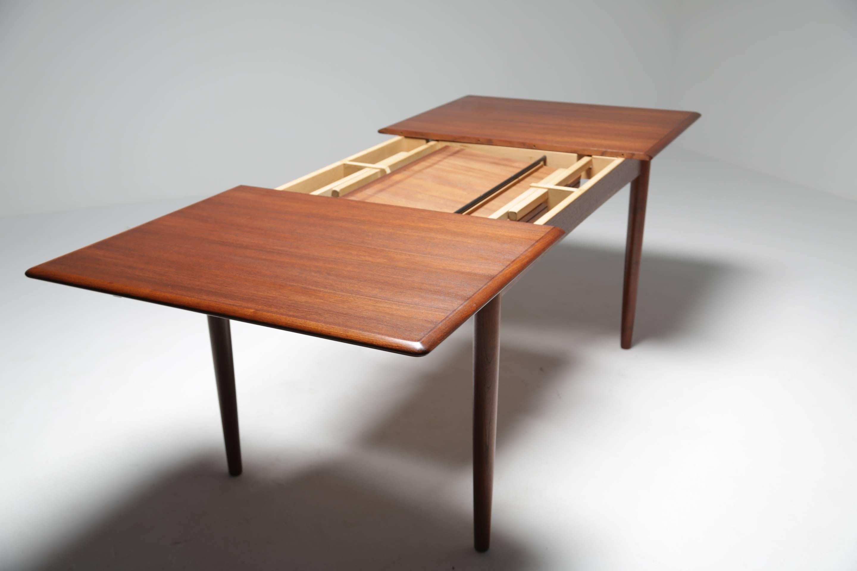 Mid-Century Modern Fully restored Scandinavian modern Dyrlund teak extending dining table .