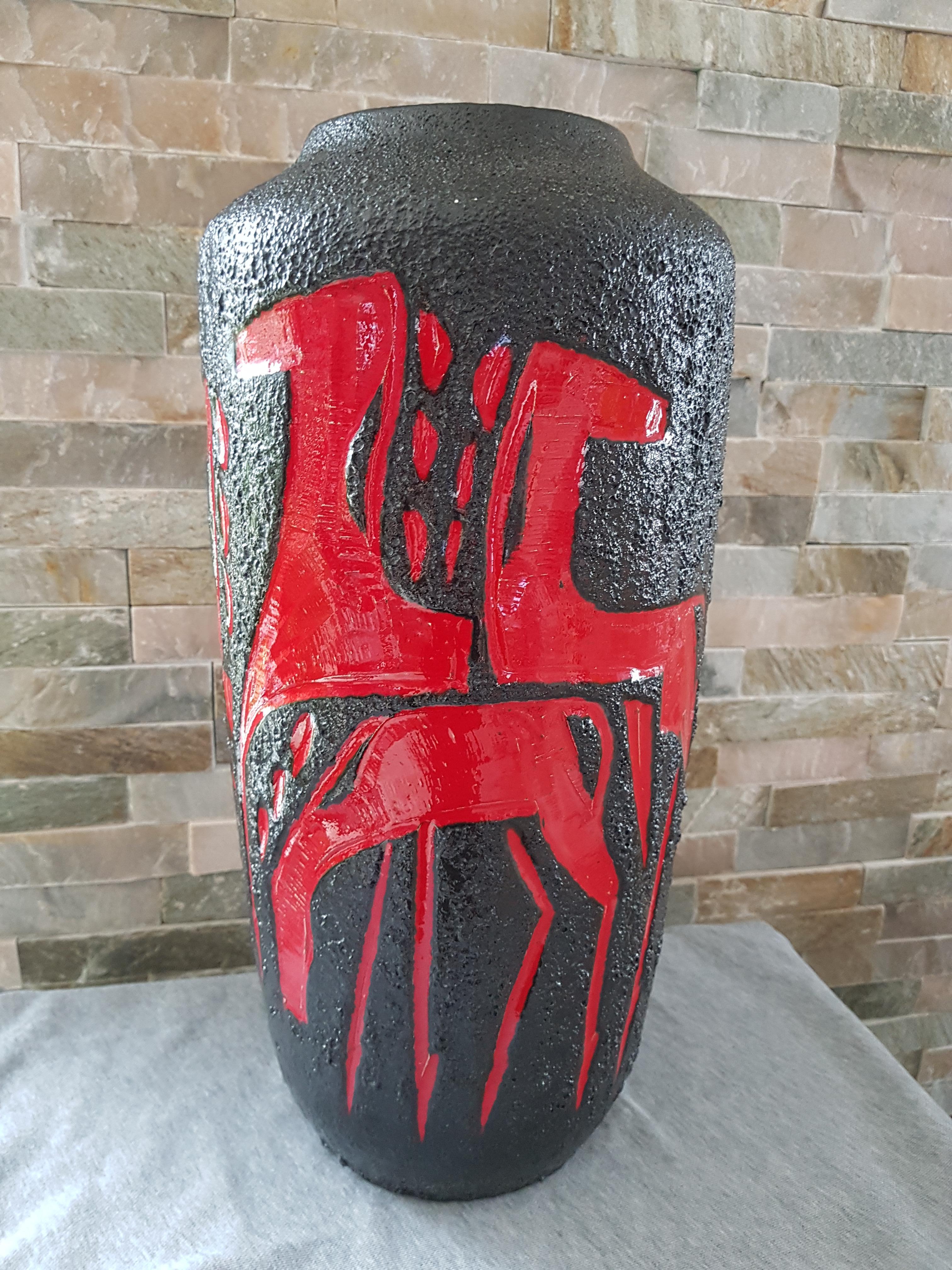 Midcentury fat lava vase from Scheurich, Germany, 1960s. perfect vintage condition.

Manufactured by Scheurich, one of the most famous fat lava companies of Germany.

