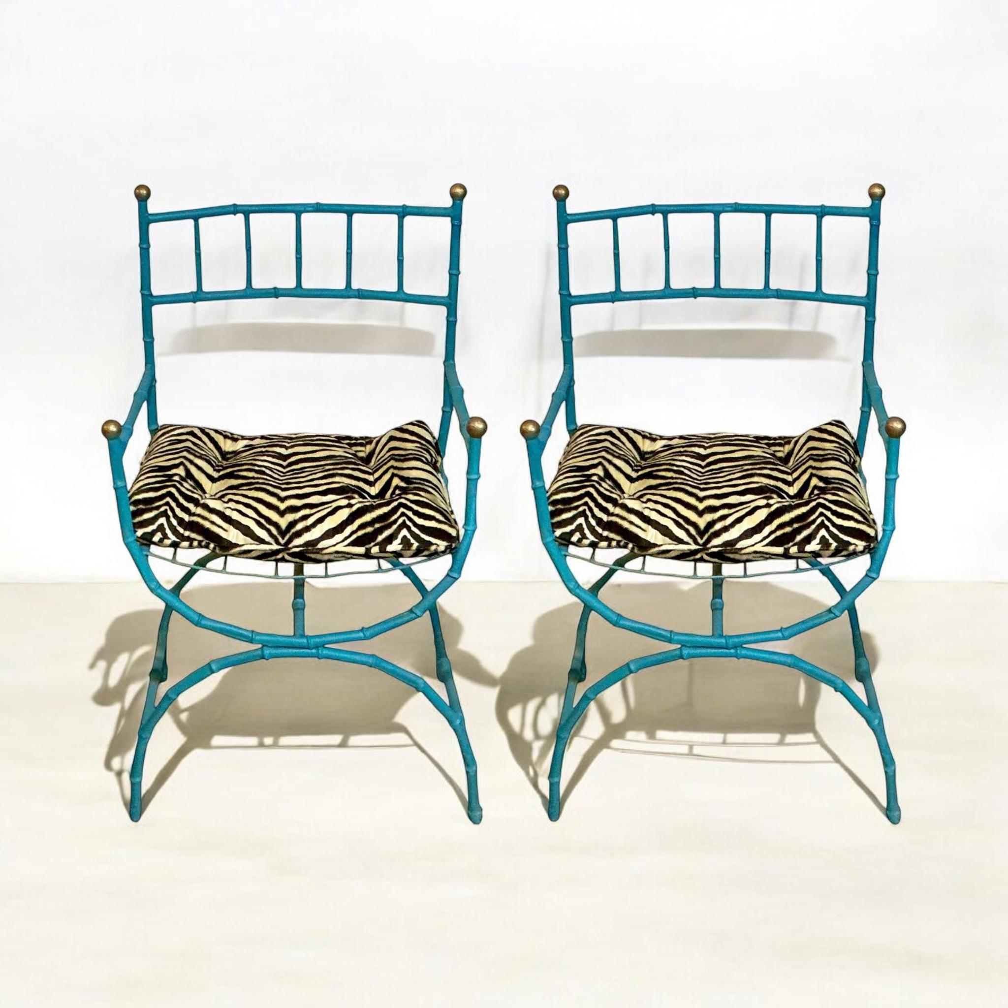 This is a set of mid-century campaign style cast aluminum faux bamboo arm chairs with a loose zebra velvet cushion. The finish and cushion are not original. The seat height without the cushion is 18”….cushion adds another two inches. I believe I