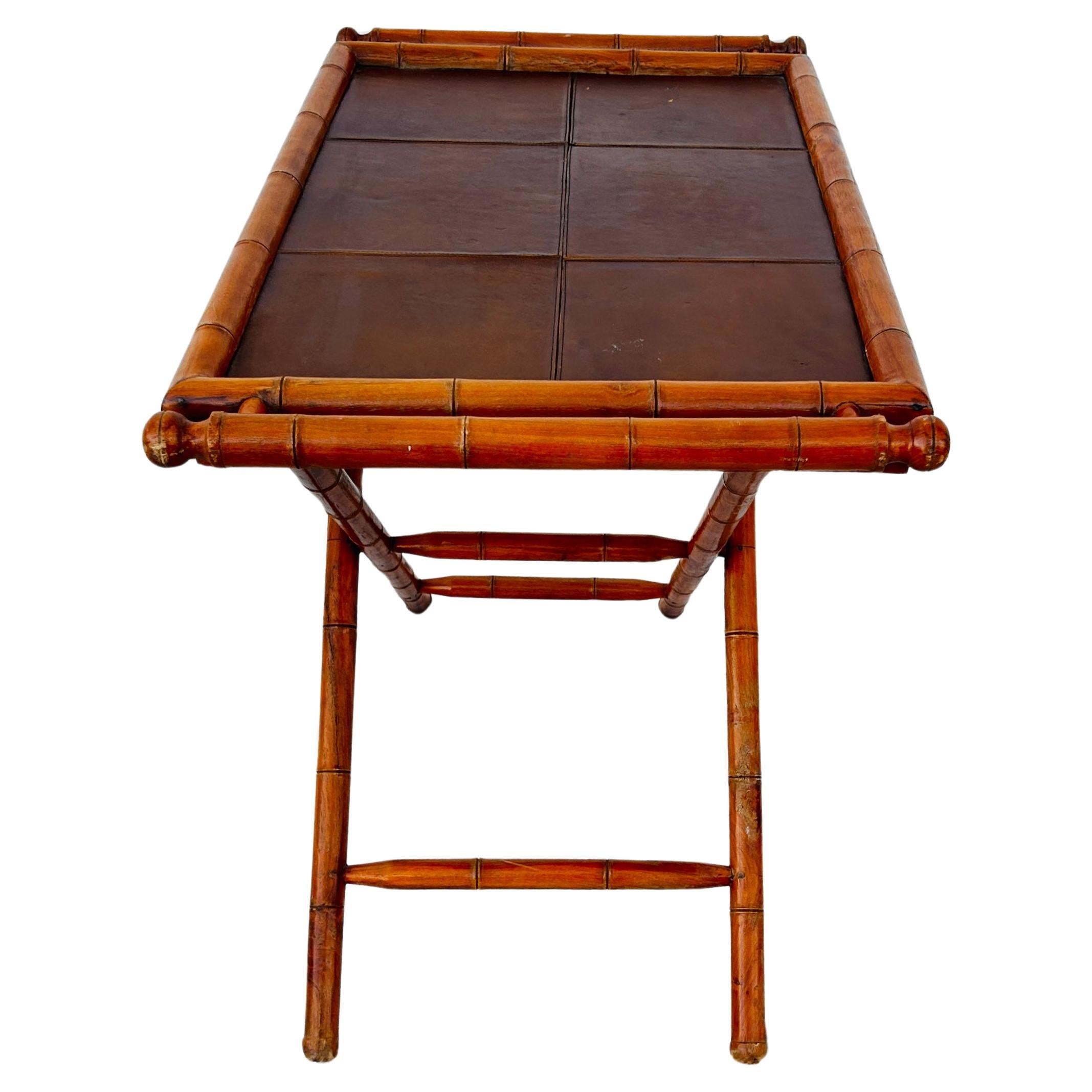 20th Century Mid-Century Faux Bamboo Folding Tray Table with Leather Insert For Sale