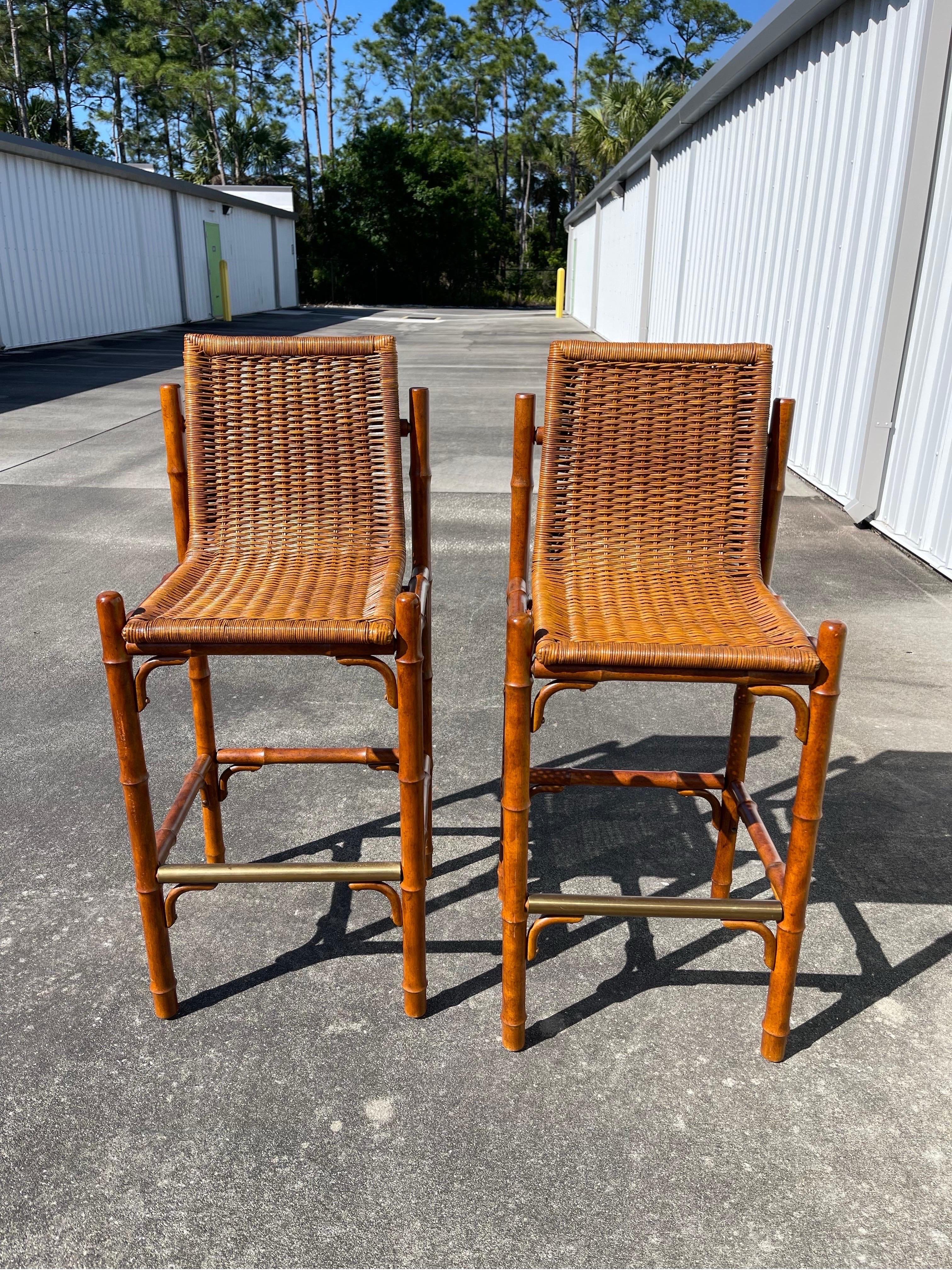 Unusual pair of faux bamboo barstools with floating seats made of woven wicker.


Third stool is available but damaged. Cane seat has multiple breaks. I am 170lbs and it holds me without a problem. I will include this third stool if buyer requests,