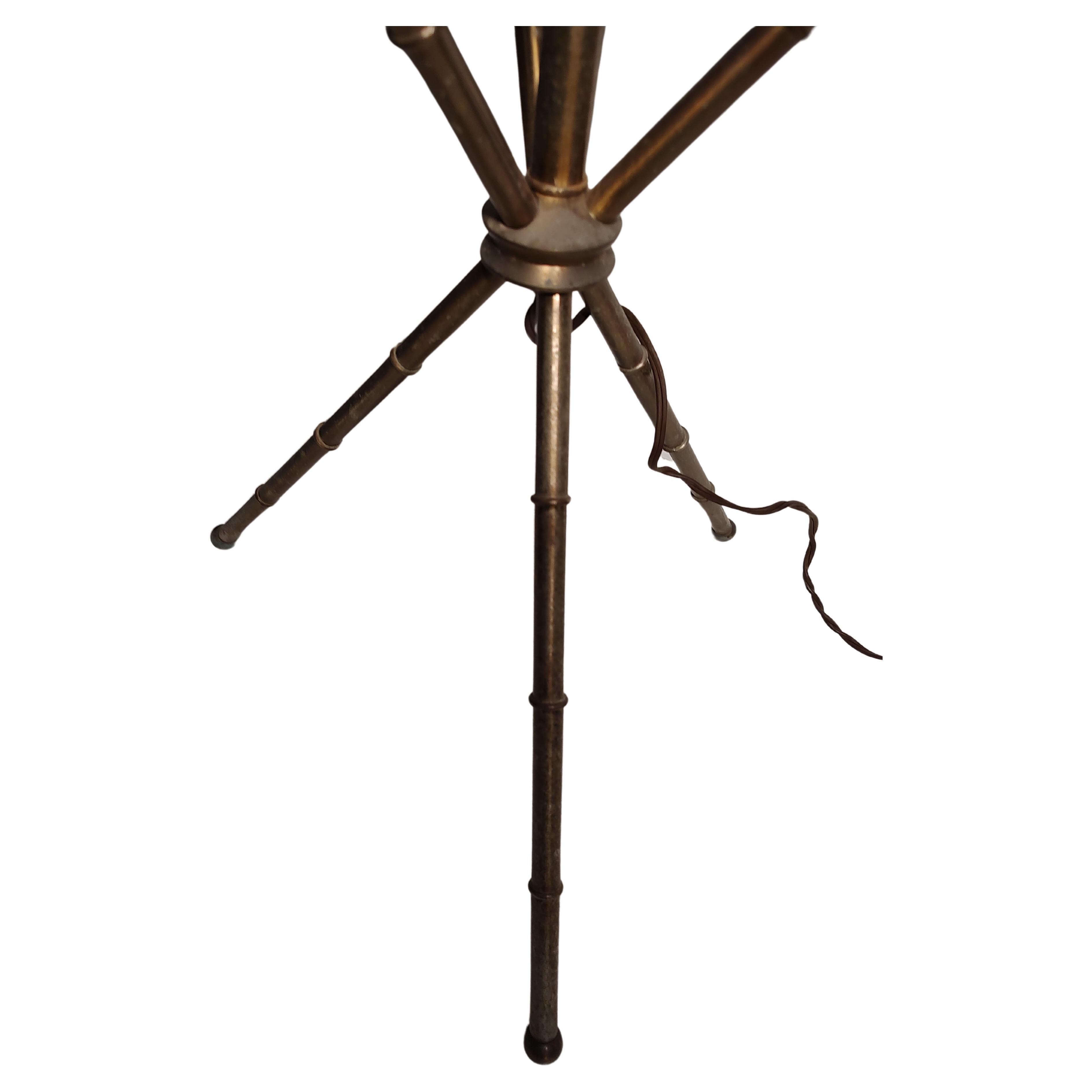 Simple and elegant floor lamp designed in the Neoclassical style using a faux bamboo base and a Carrara marble table top. Base is a tripod collaboration which works so well in support of the marble. Shade is 15x 14 and comes with the lamp. Some age