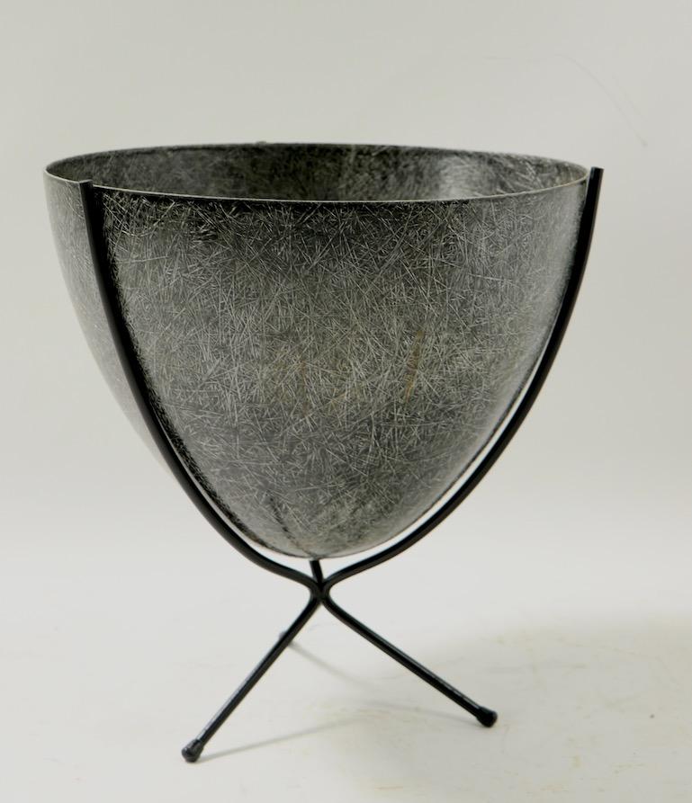 Classic mid century fiberglass bullet planter by Kimball Mfg. Corp. (signed). Elephant hide grey with visible fiberglass strands, wrought iron tripod base. Very good original condition, showing only light cosmetic wear, normal and consistent with