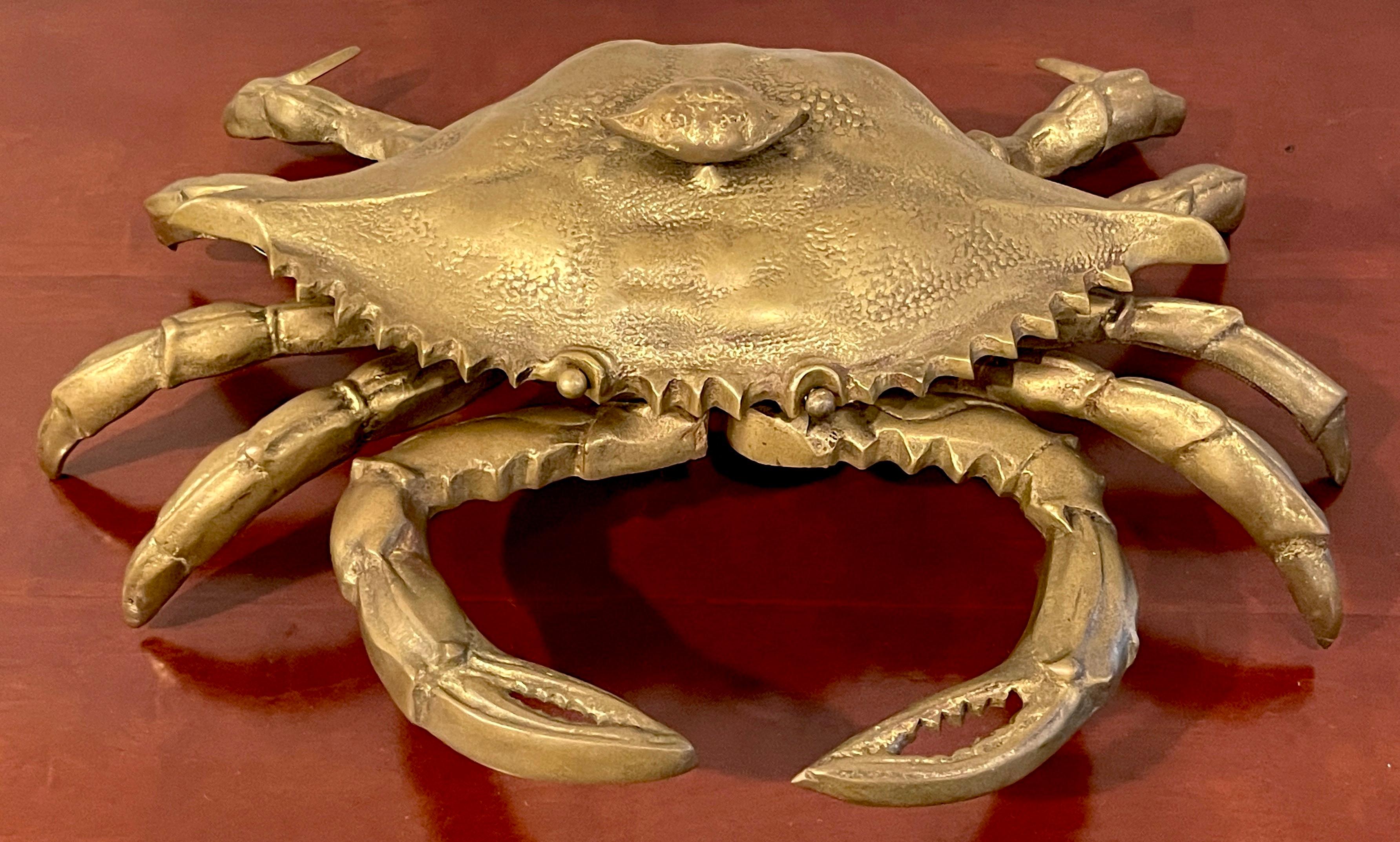 Mid century figural brass crab box by Sarried Ltd.
Substantial proportions, realistically cast and modeled of a crab with a lift top, revealing a 13-Inch wide x 6-inch deep interior.
Unmarked.
 