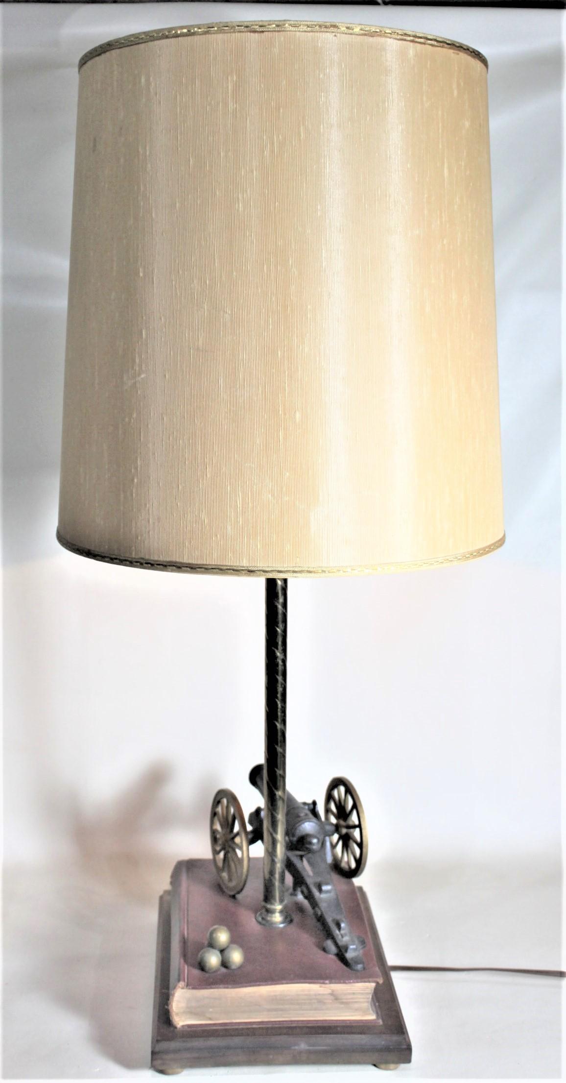 Canadian Midcentury Figural Cast Iron Canon and Leather Book Table or Desk Lamp For Sale
