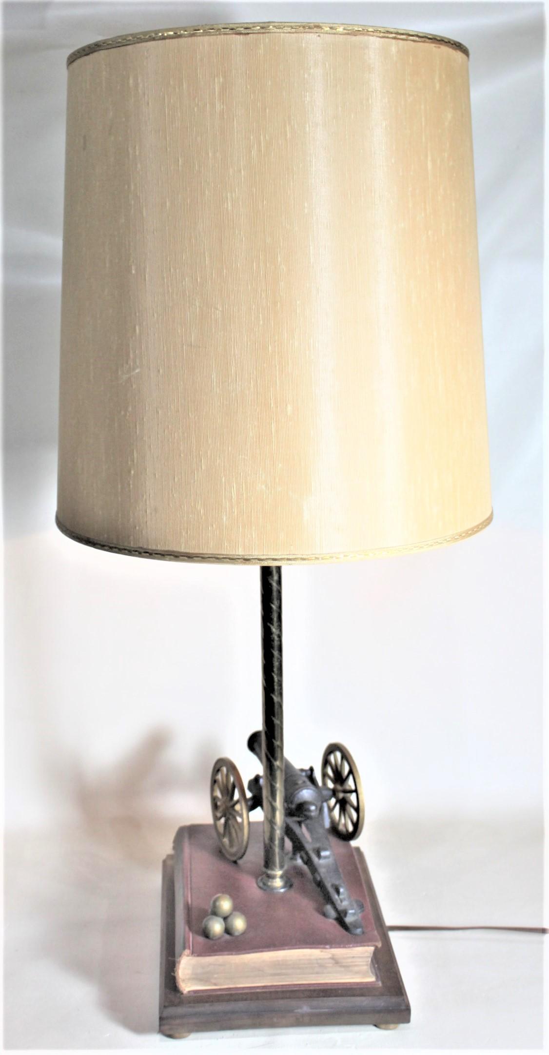Machine-Made Midcentury Figural Cast Iron Canon and Leather Book Table or Desk Lamp For Sale