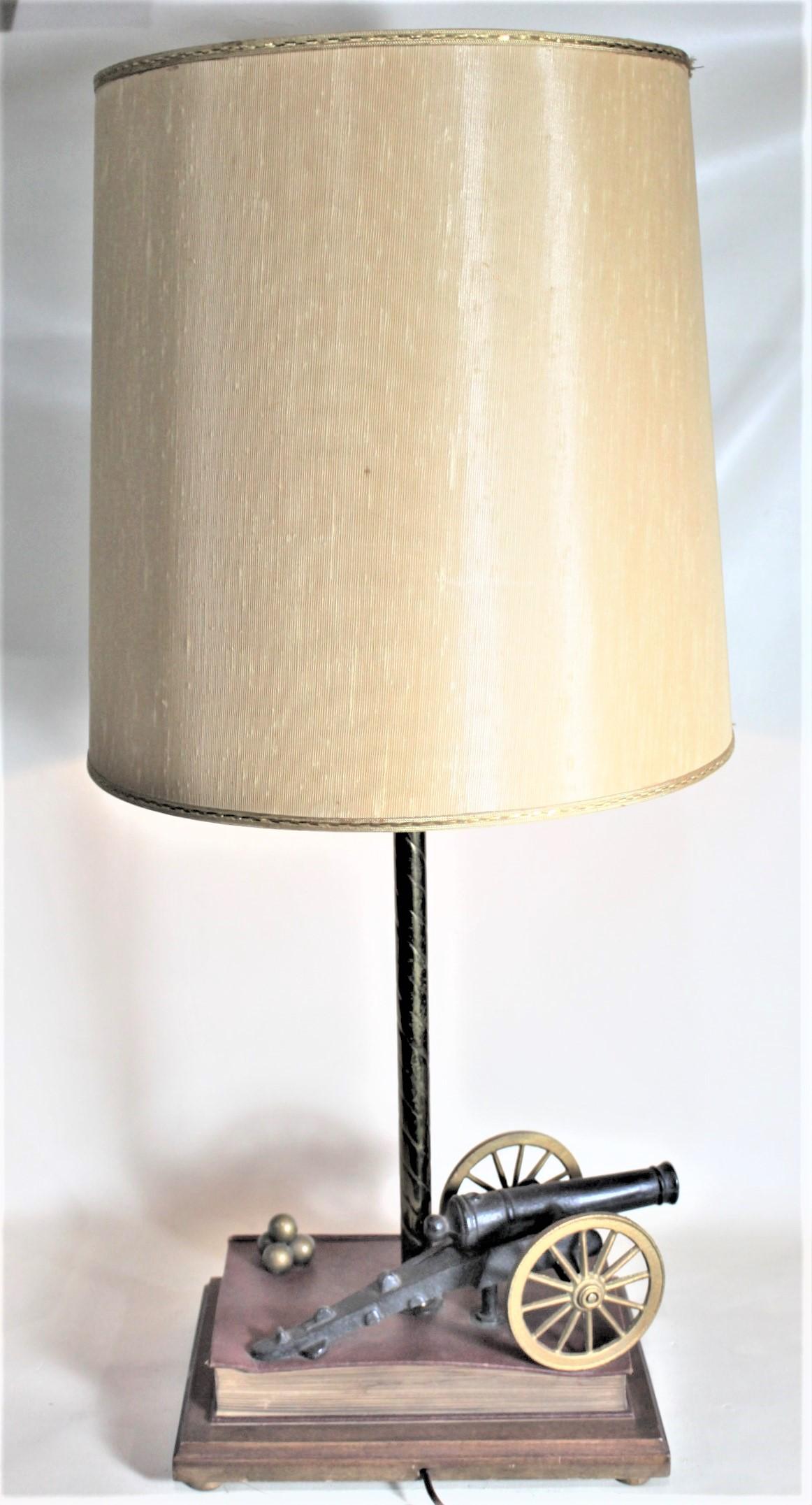 Midcentury Figural Cast Iron Canon and Leather Book Table or Desk Lamp In Good Condition For Sale In Hamilton, Ontario