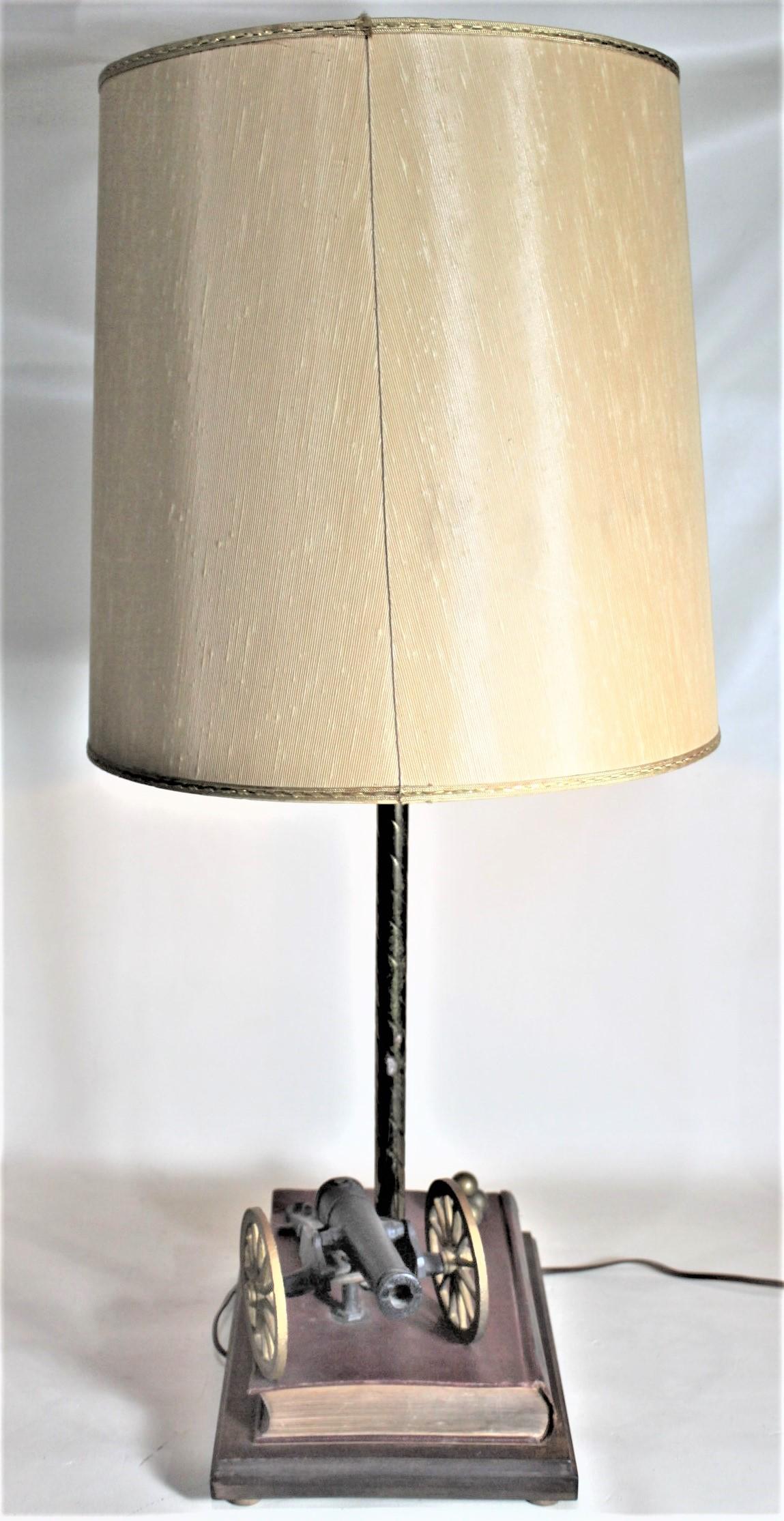 20th Century Midcentury Figural Cast Iron Canon and Leather Book Table or Desk Lamp For Sale