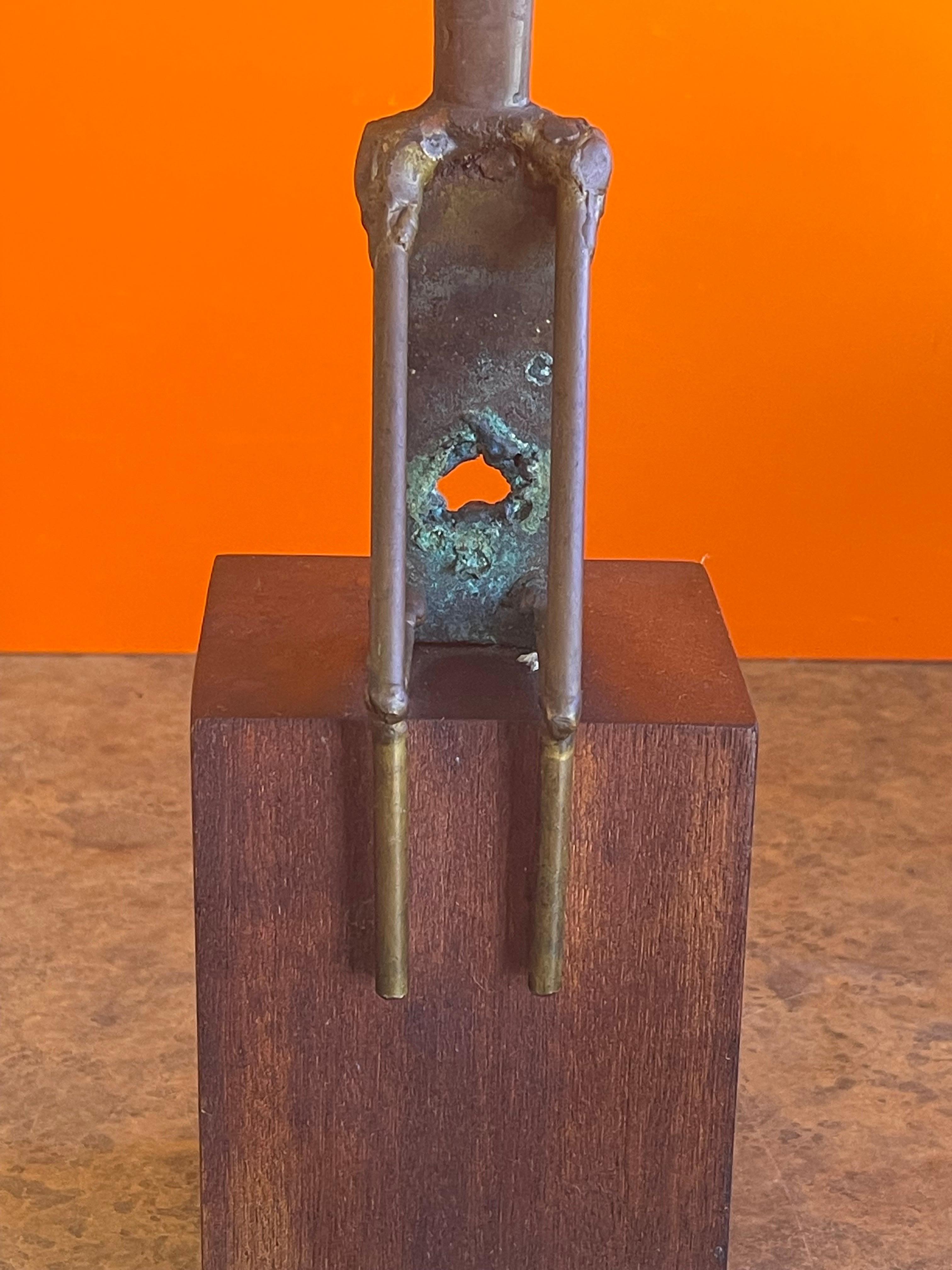 American Mid-Century Figural Sculpture on Walnut Base Entitled 