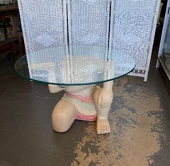 Mid Century Figurative Wood Carved and Glass Top Coffee Table