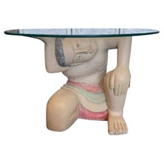 Mid Century Figurative Wood Carved and Glass Top Coffee Table