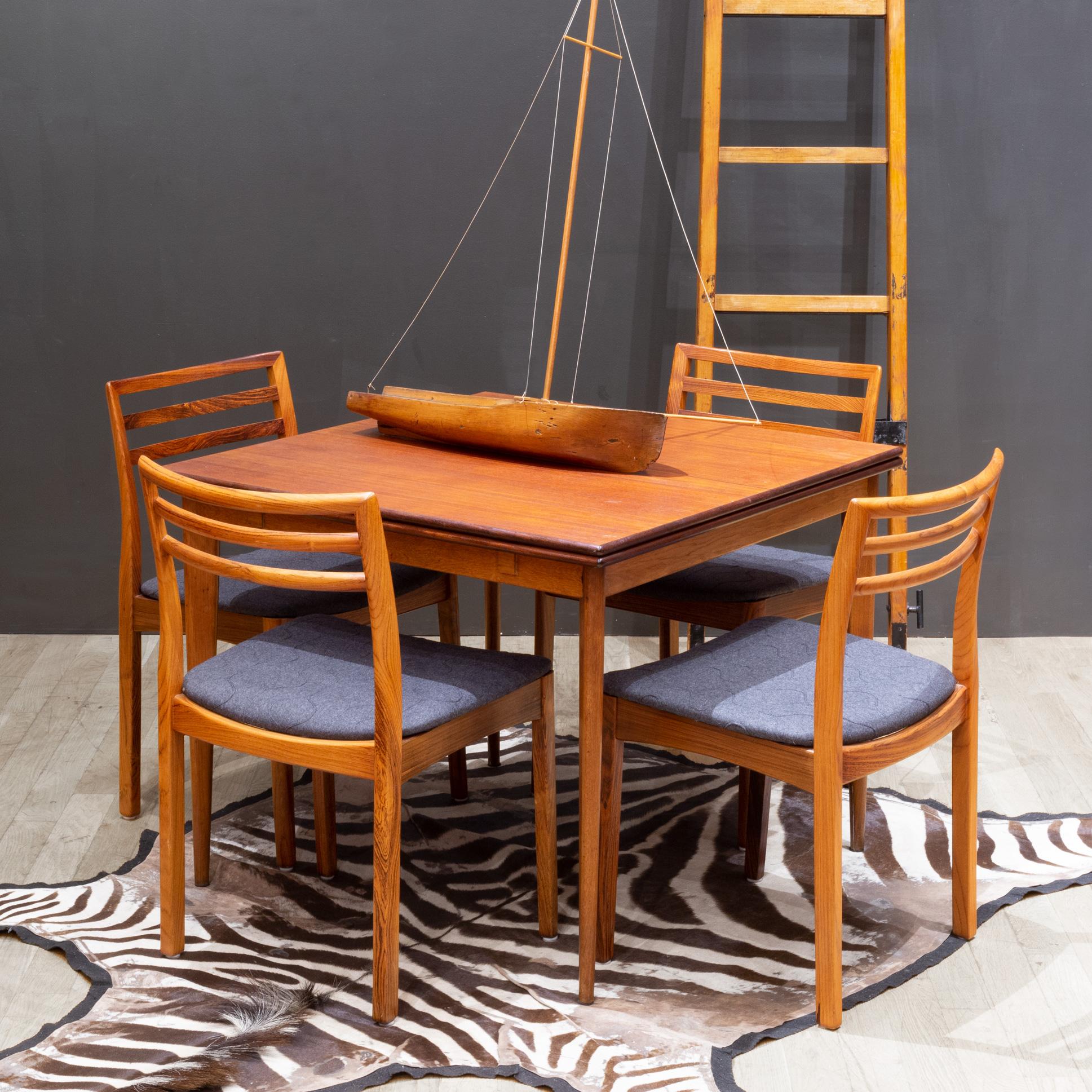 ABOUT

Contact us for more shipping options: S16 Home San Francisco. 

An original midcentury Teak fliptop dining table with brass brackets. The table can easily be expanded from square to rectangle by pulling the top to one side and flipping one