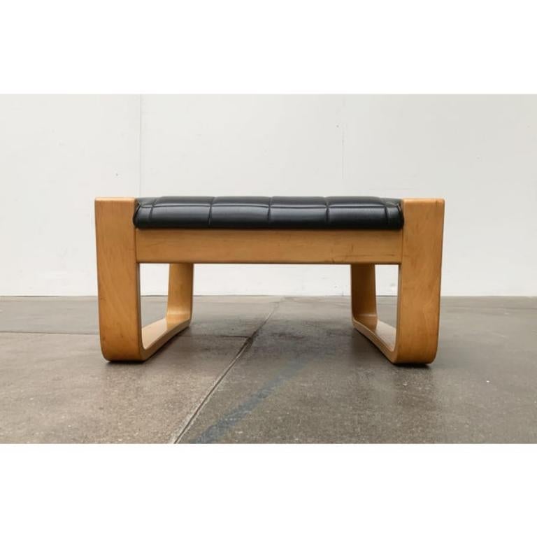 Ottoman for the Pulkka Lounge Chair with by the Finnish manufacturer Asko after a design by Ilmari Lappalainen from the 60s. As an ottoman for the matching Pulkka Lounge Chair or as a single stool.

A simple and functional design. The stool consists