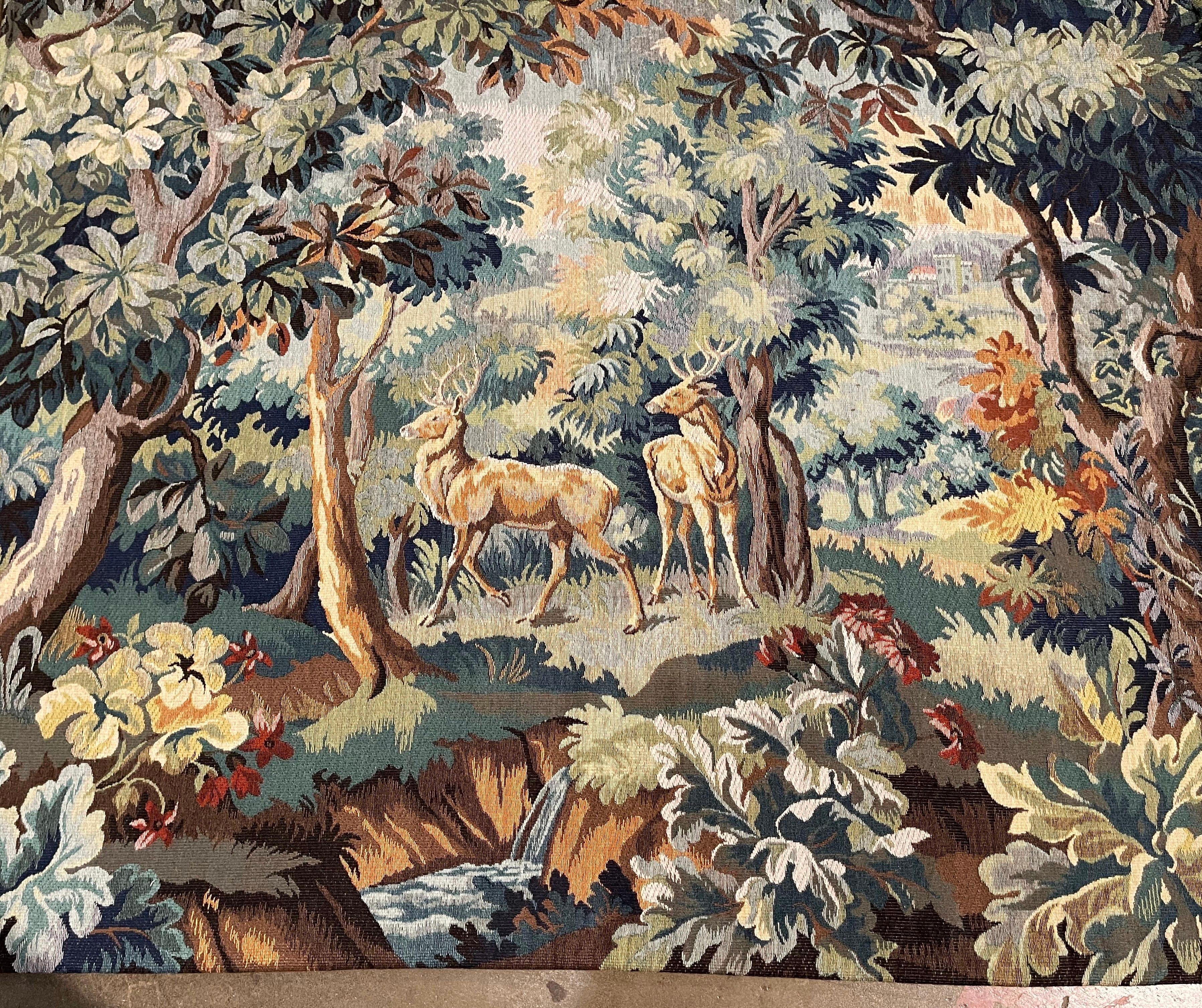 Decorate a ranch or a hunting lodge with this colorful verdure tapestry. Hand woven with machine help in Belgian circa 1960 and titled 