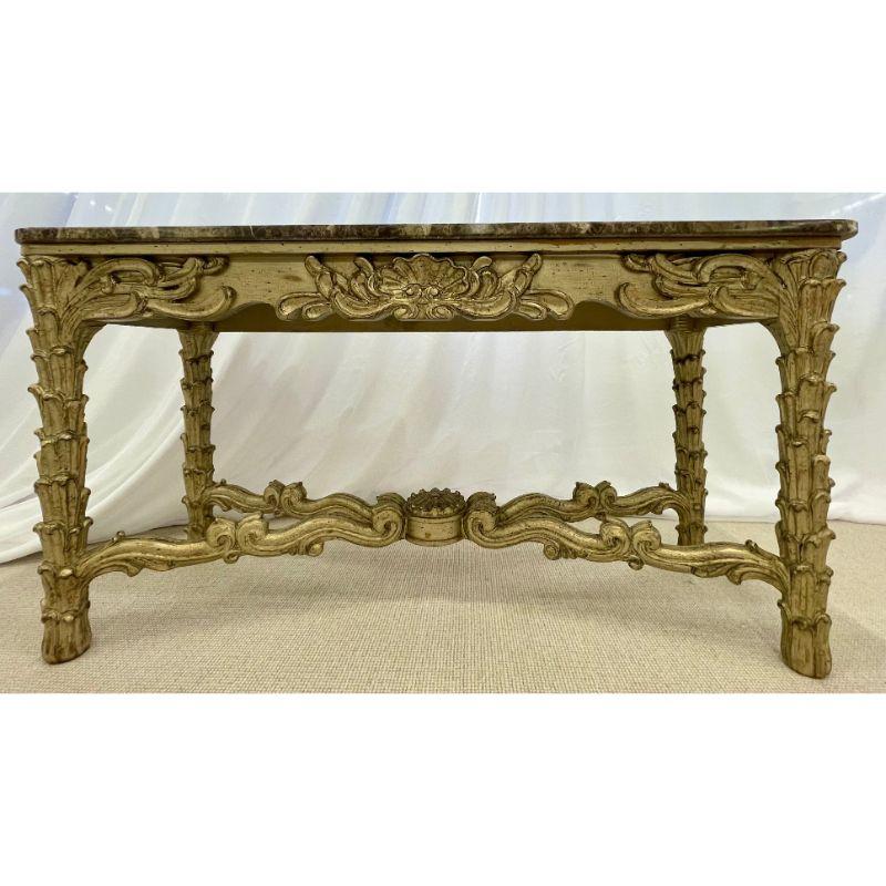 A Fleur de Lis Style Mid Century Modern Console or Sofa Table supporting a rounded front marble top. The whole supported by a finely detailed undercarriage. This finely constructed wood and plaster console or sofa table has certainly been crafted in