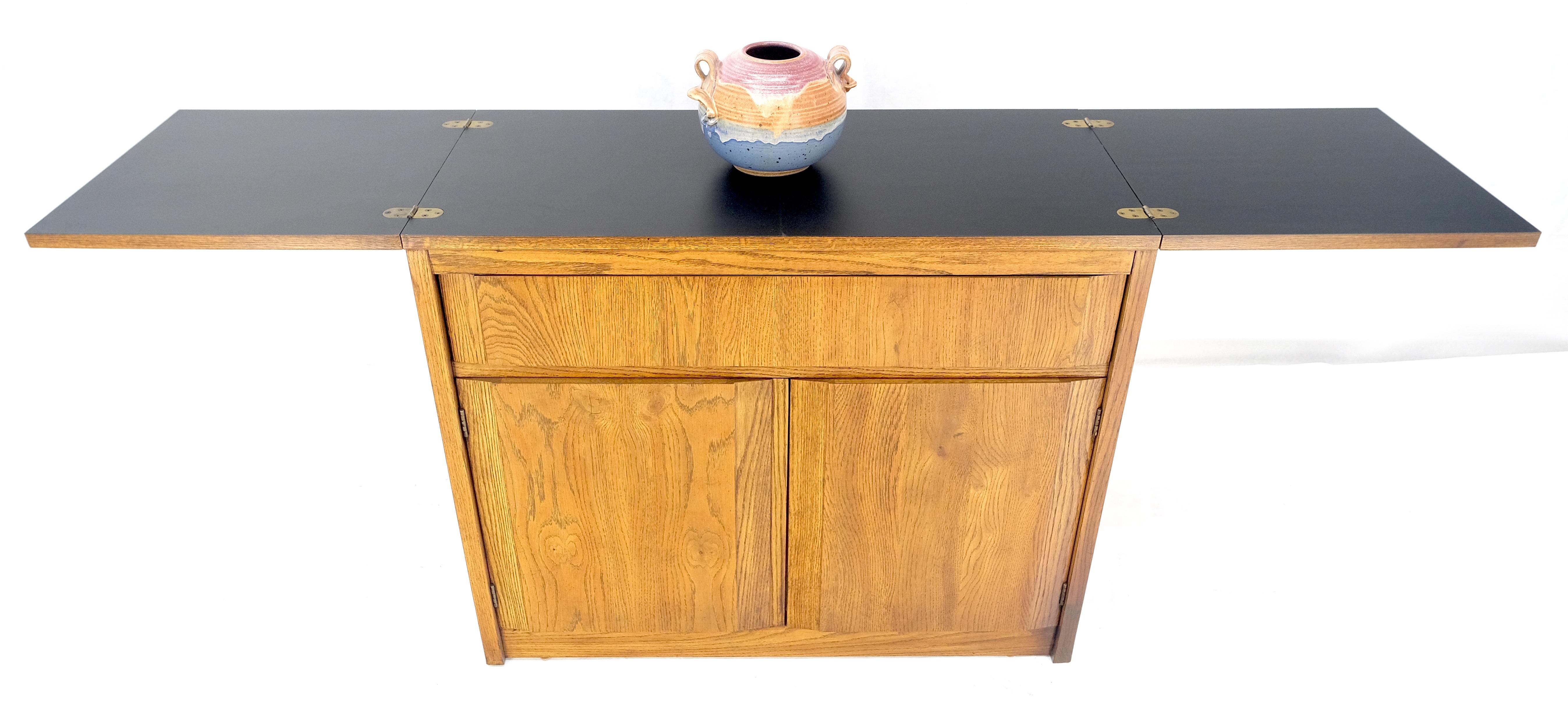 20th Century Mid Century Flip Top Oak Liquor Cabinet Server Small Sideboard on Wheels MINT For Sale