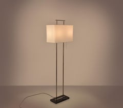 Mid - century floor lamp, base in black marble and chromed metal structure.