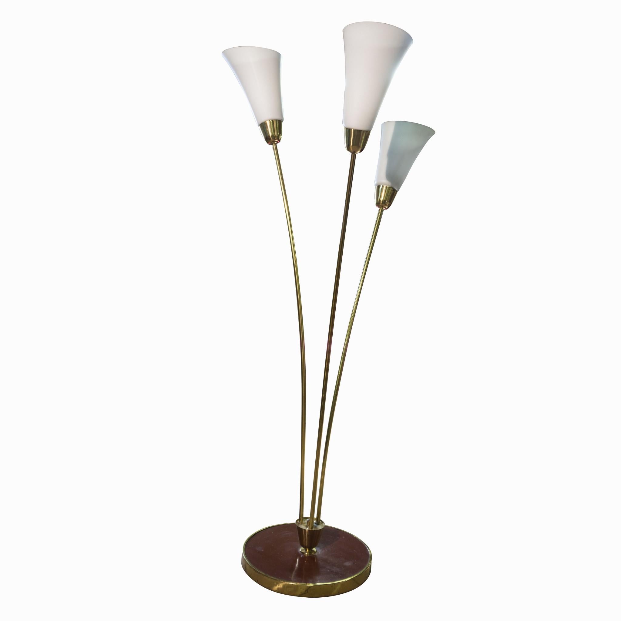 Typical example of mid century standing lamp associated with “Brussels period” and world-renowned EXPO58. Nickel plated construction, three milk glass lampshades. New wiring. In excellent condition.

Height: 153 cm

diameter of lampshade: 68 cm.
